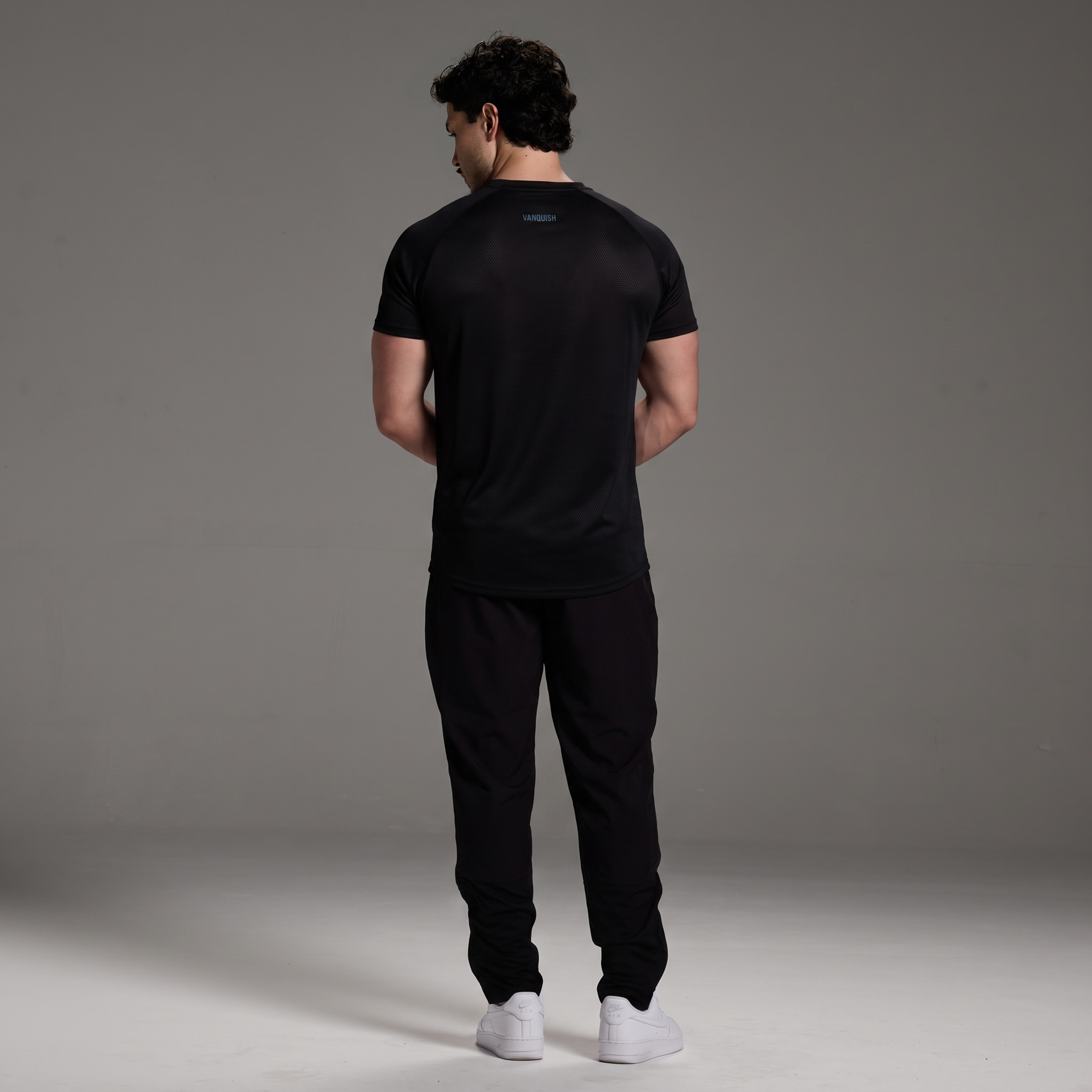 EVOLVE BLACK SLIM FIT PERFORMANCE T SHIRT
