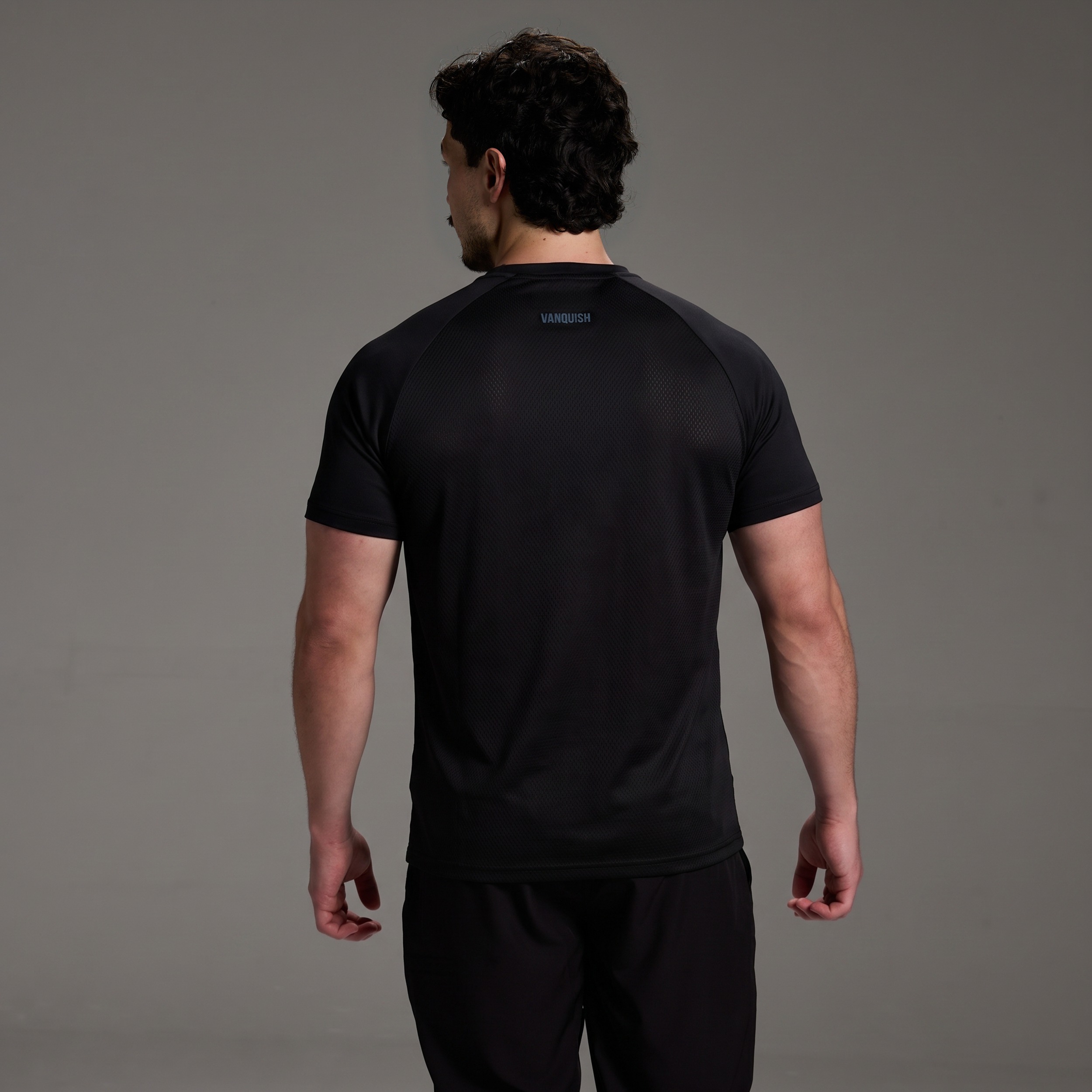 EVOLVE BLACK SLIM FIT PERFORMANCE T SHIRT