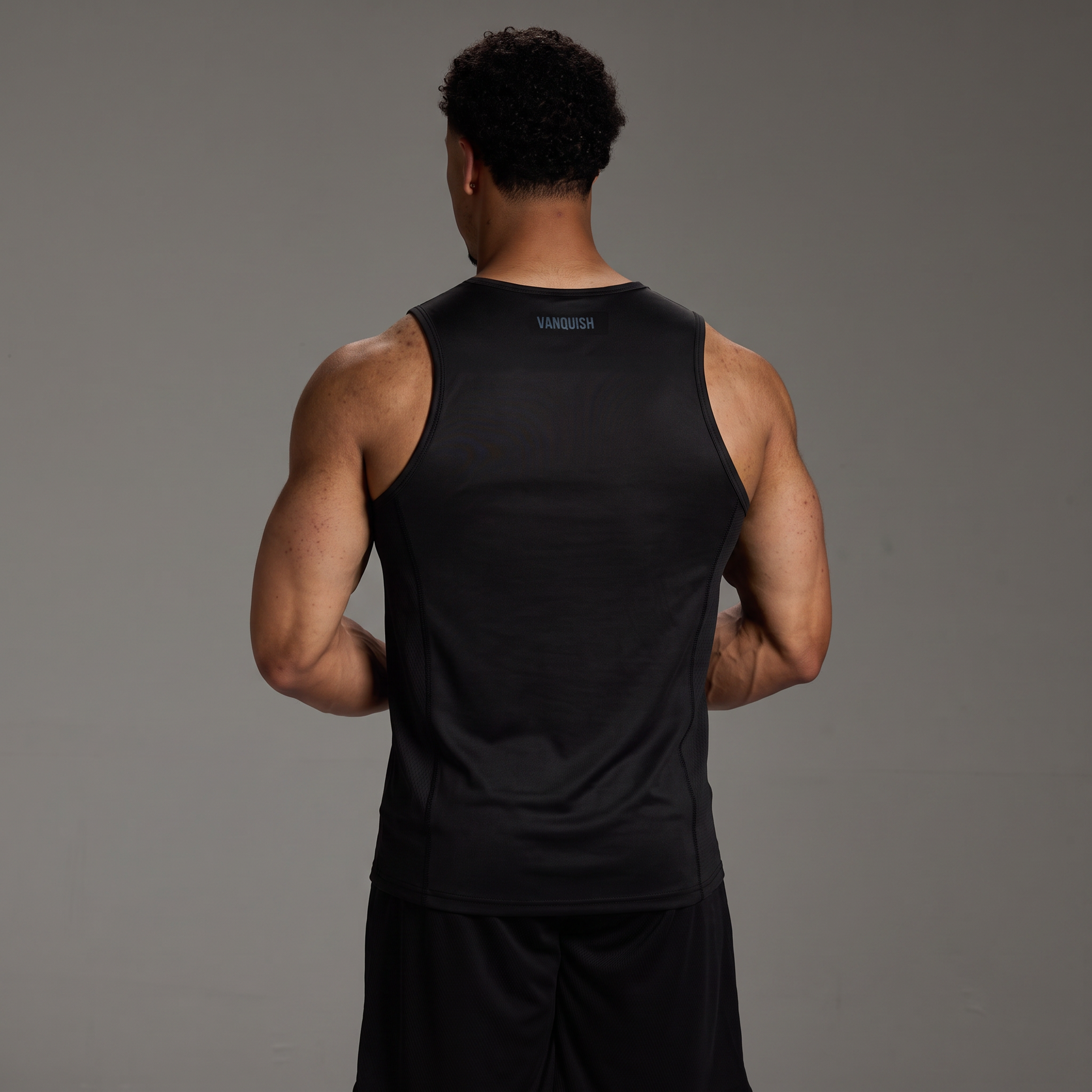 EVOLVE BLACK SLIM FIT PERFORMANCE TANK