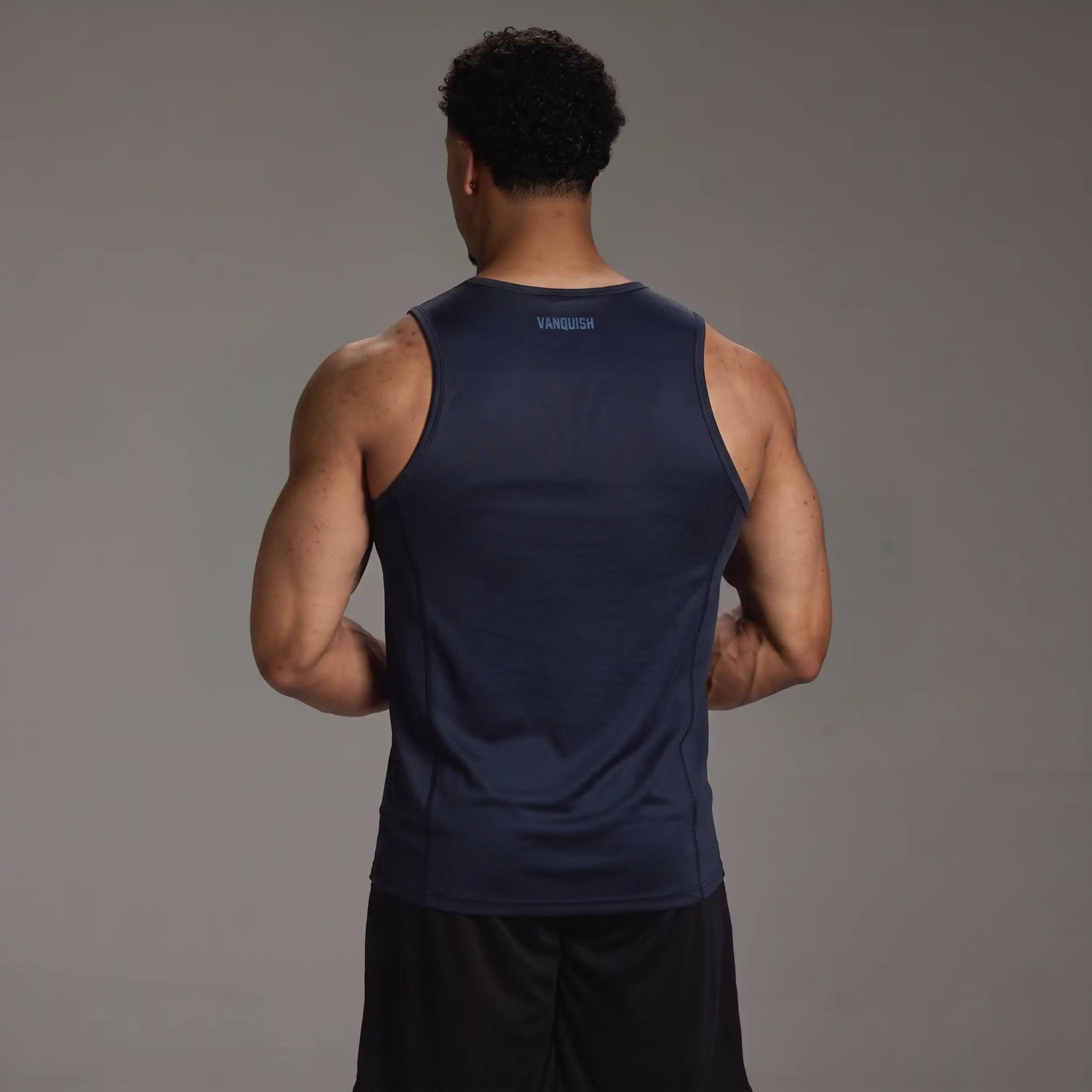 EVOLVE NAVY SLIM FIT PERFORMANCE TANK