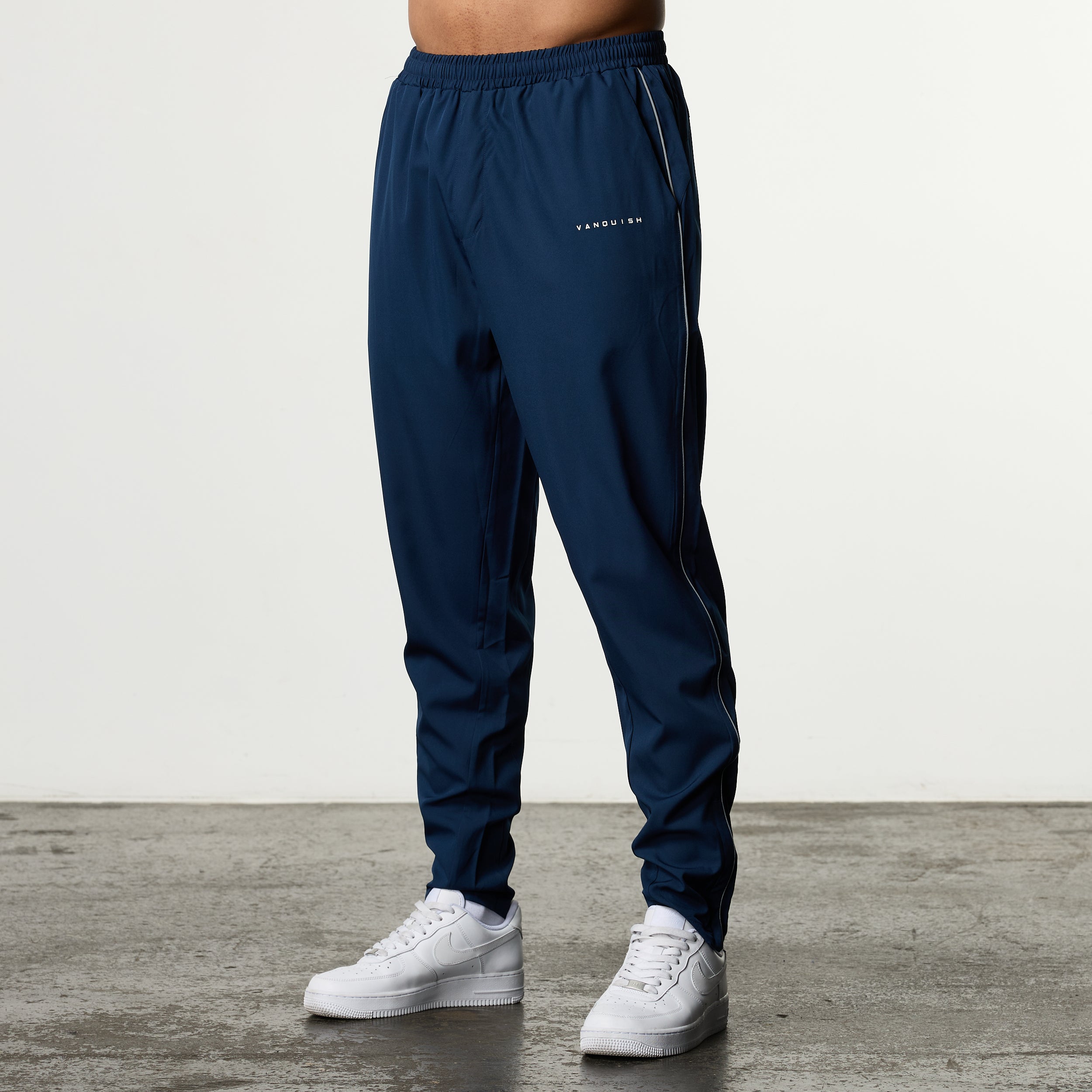 ACADEMY NAVY PERFORMANCE WOVEN SWEATPANTS