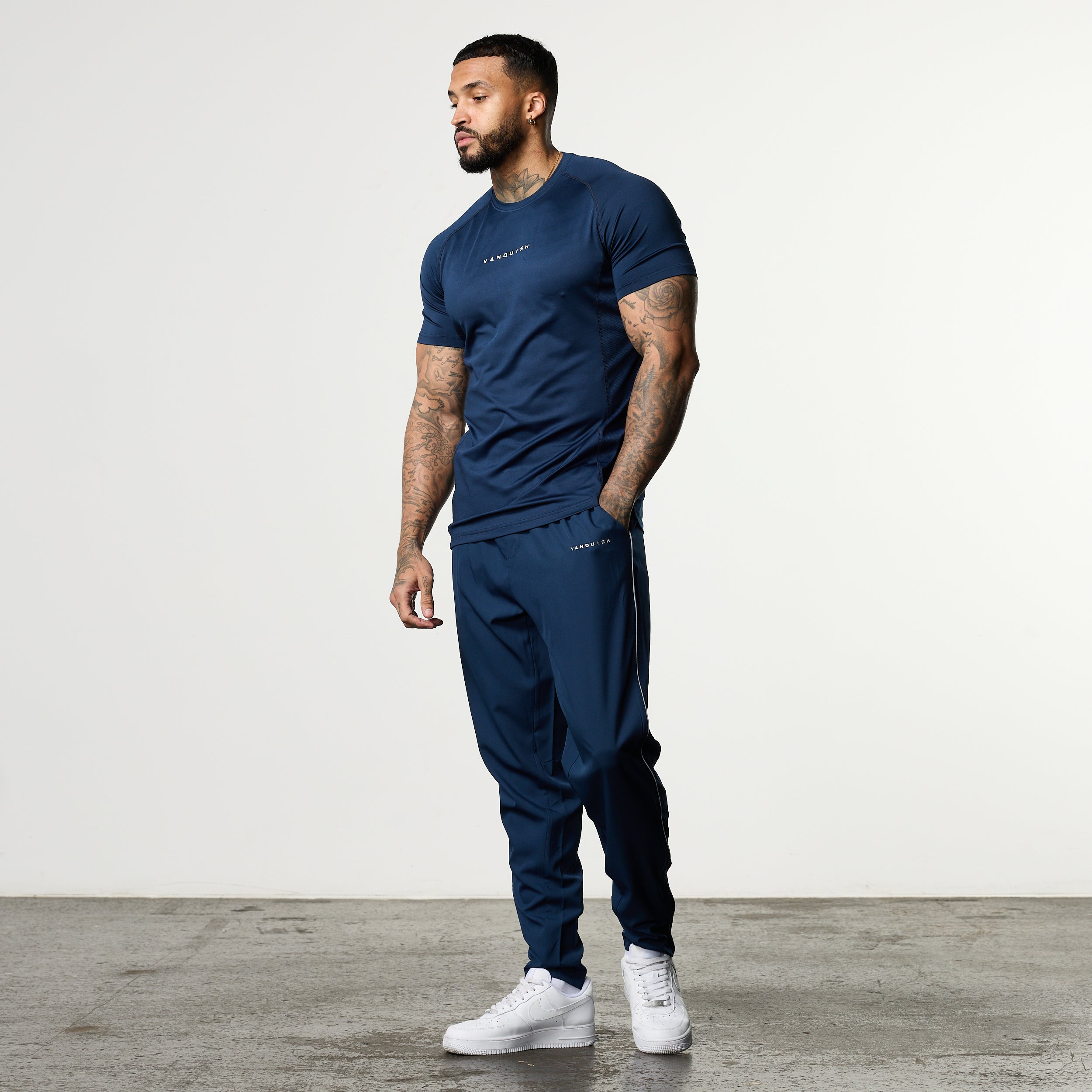 ACADEMY NAVY PERFORMANCE WOVEN SWEATPANTS