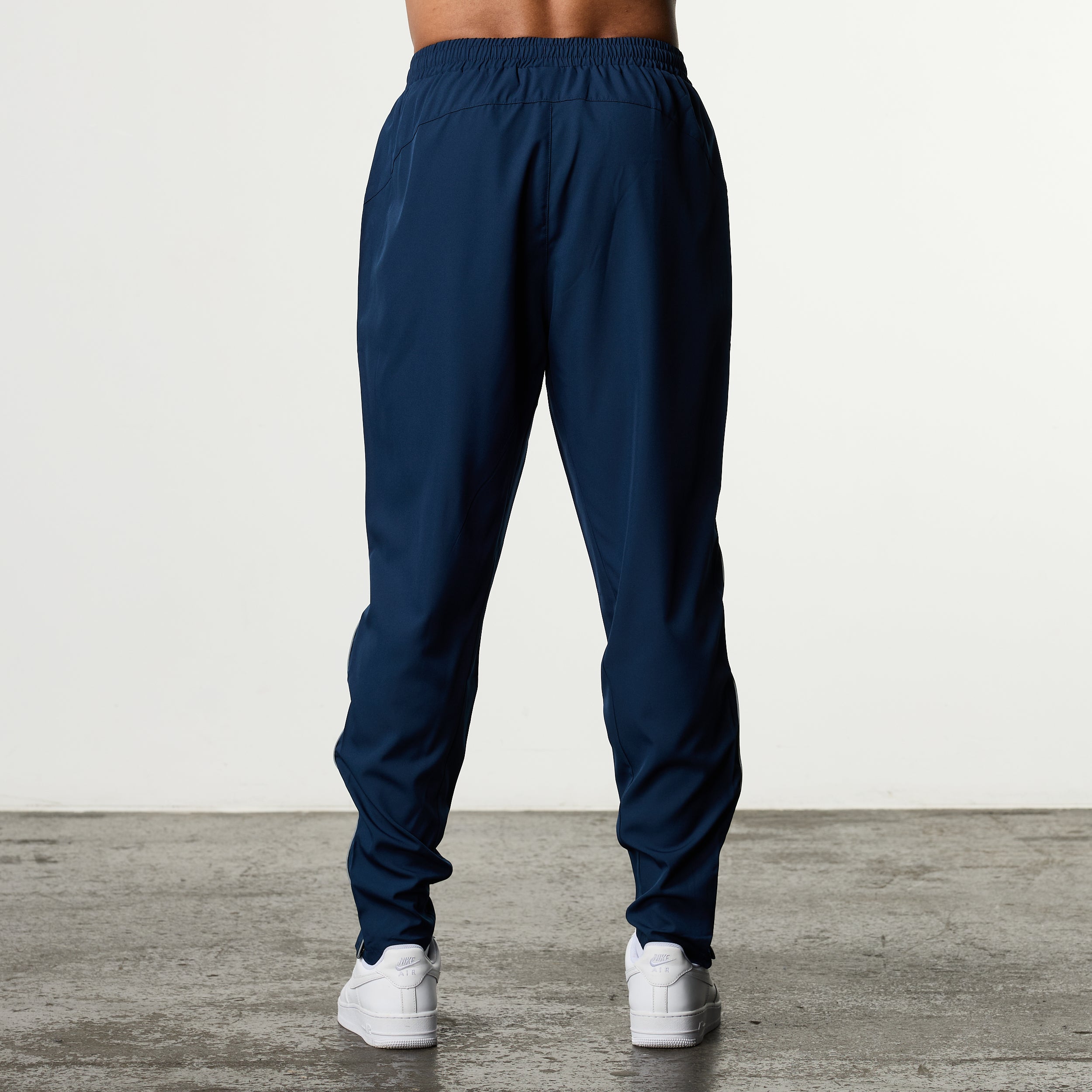 ACADEMY NAVY PERFORMANCE WOVEN SWEATPANTS