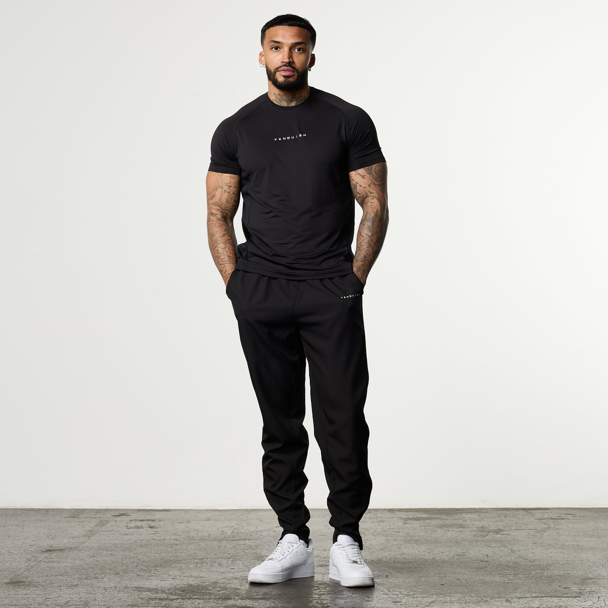 ACADEMY BLACK PERFORMANCE WOVEN SWEATPANTS
