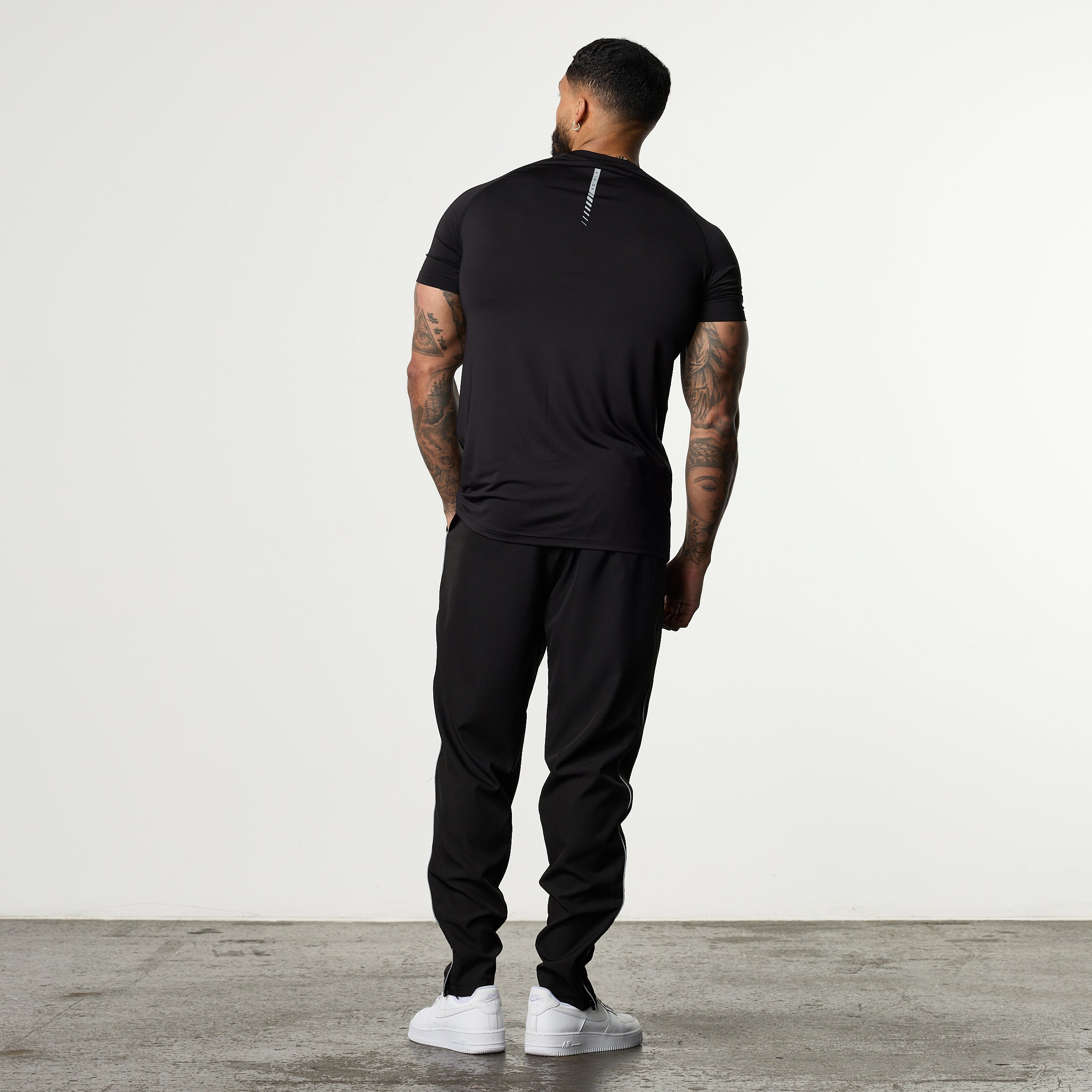 ACADEMY BLACK PERFORMANCE WOVEN SWEATPANTS