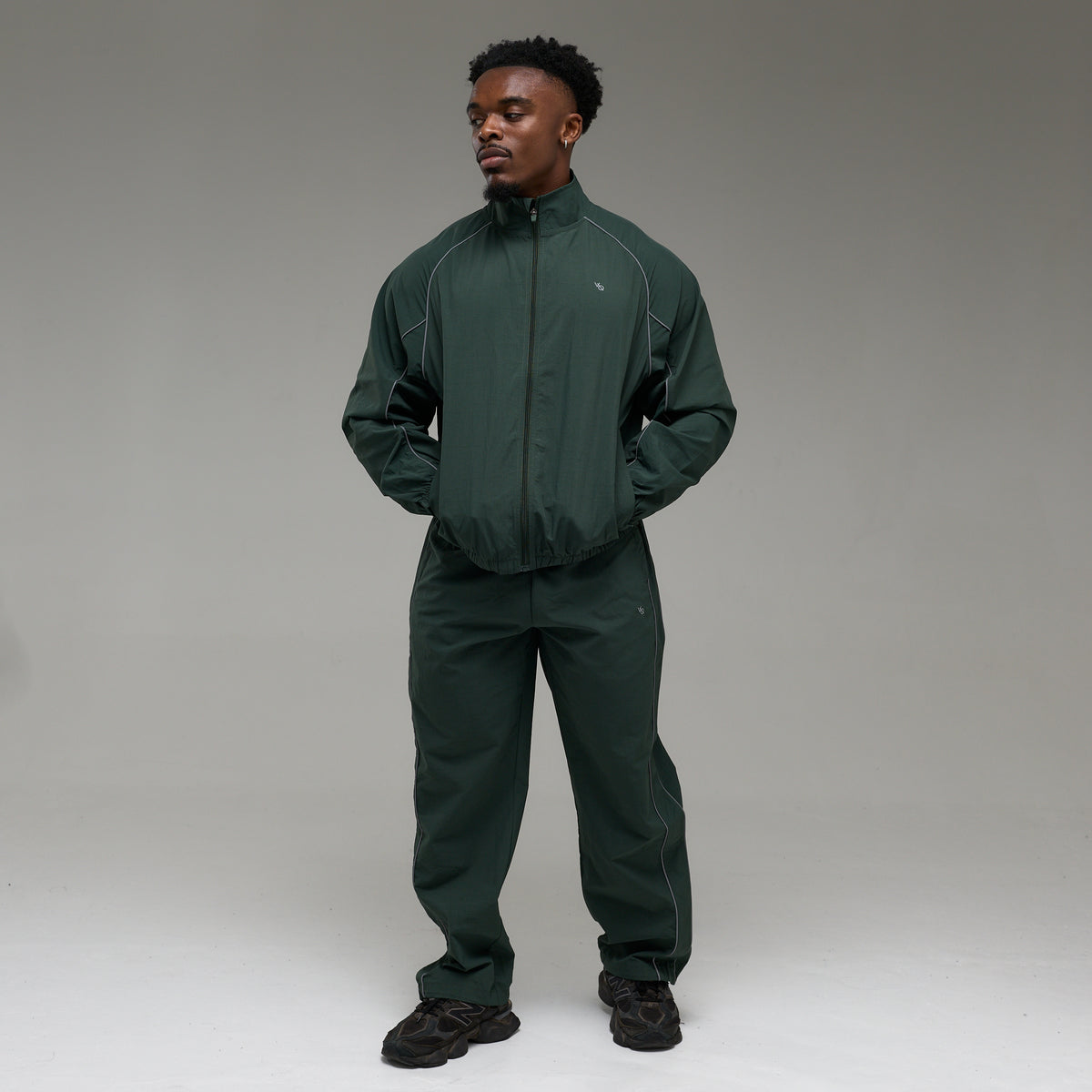 REFLECTIVE DARK GREEN OVERSIZED TRACK PANTS