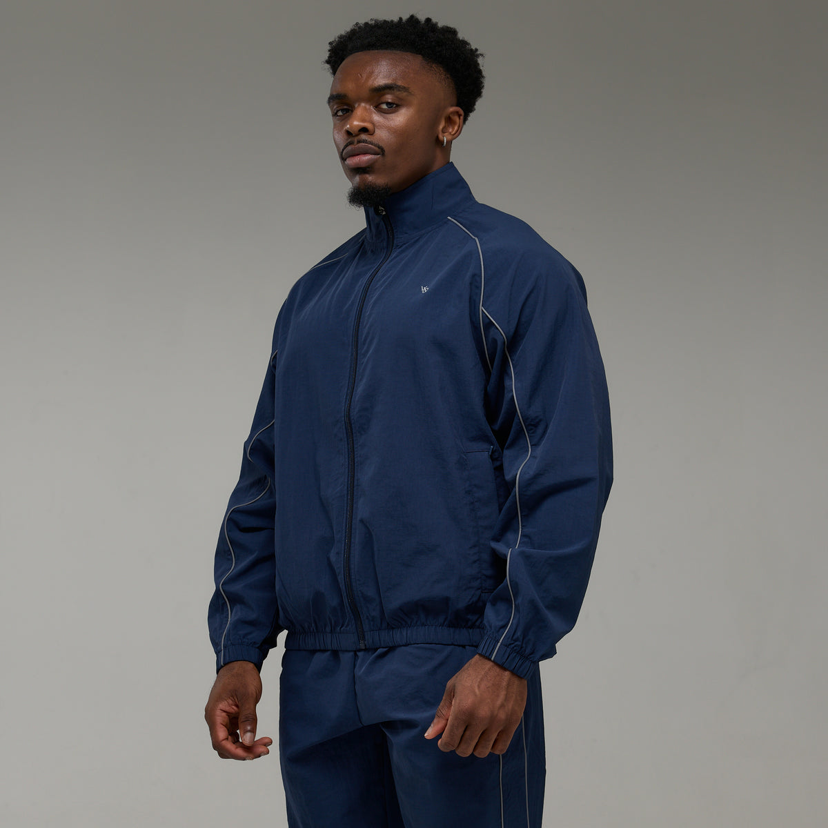 REFLECTIVE NAVY OVERSIZED TRACK JACKET