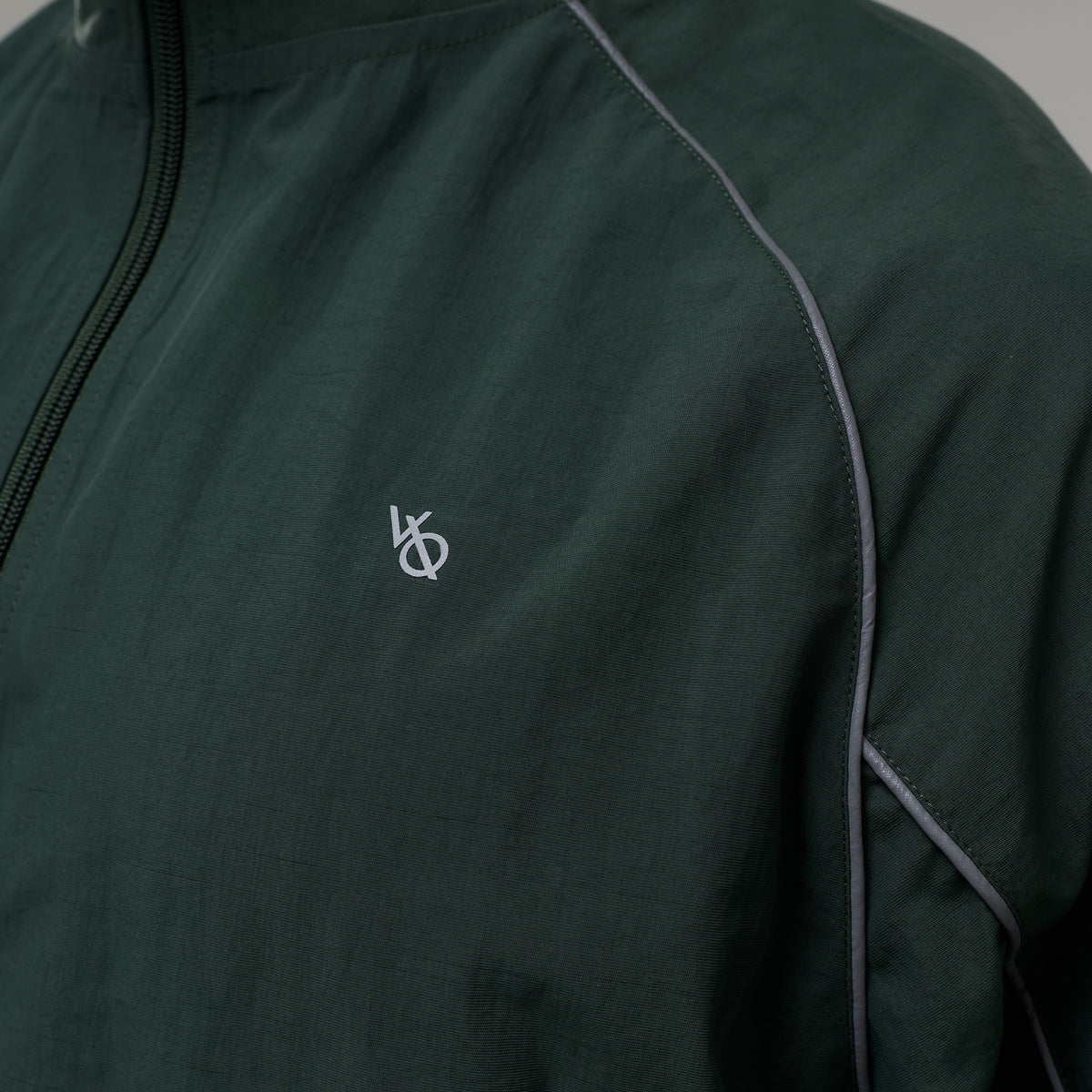 REFLECTIVE DARK GREEN OVERSIZED TRACK JACKET