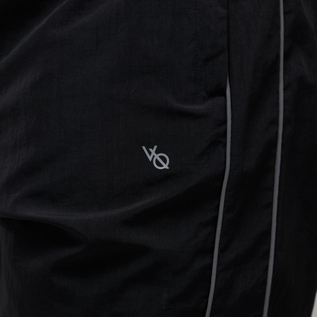 REFLECTIVE BLACK OVERSIZED TRACK PANTS