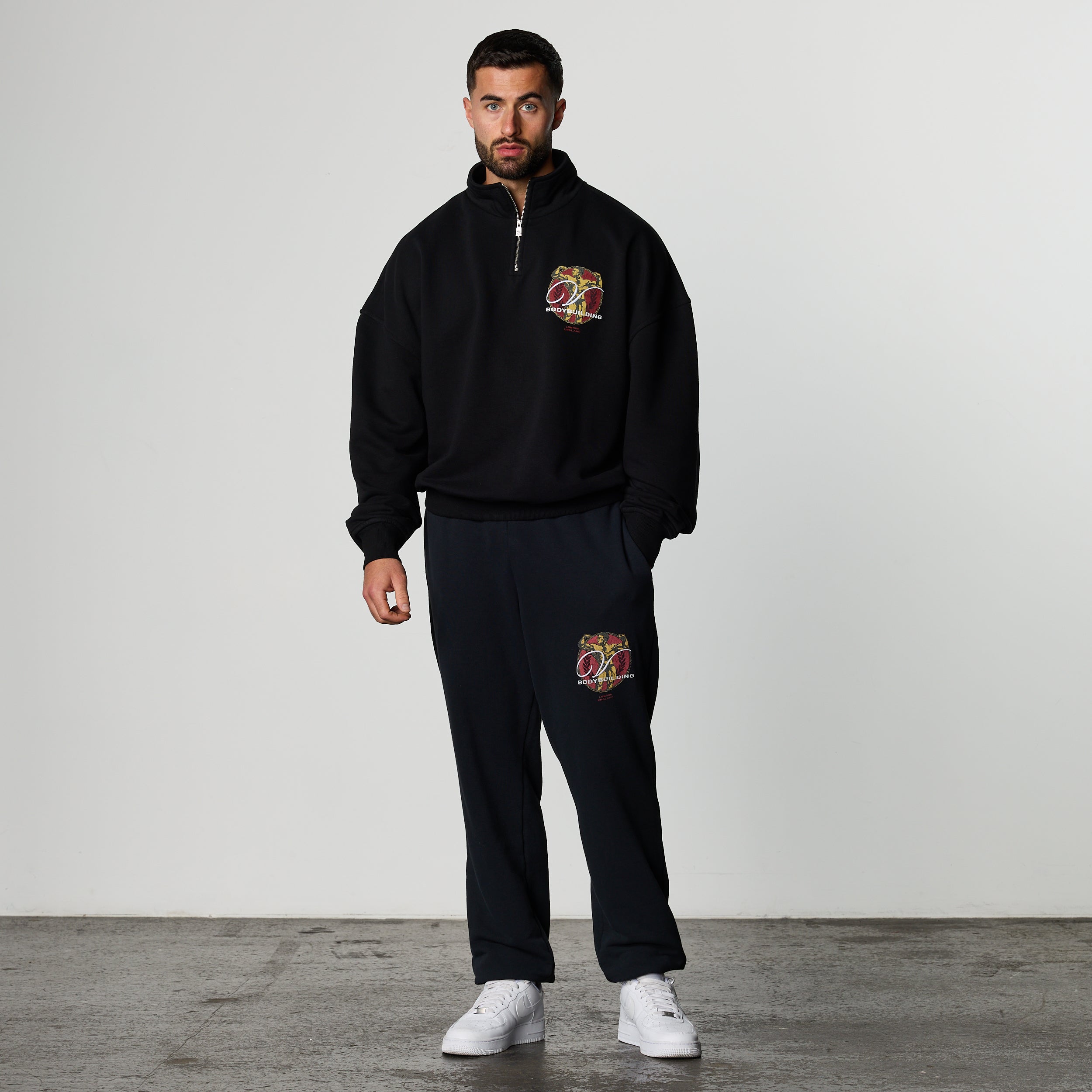 GOLDEN BOY BLACK OVERSIZED 1/4 ZIP SWEATER