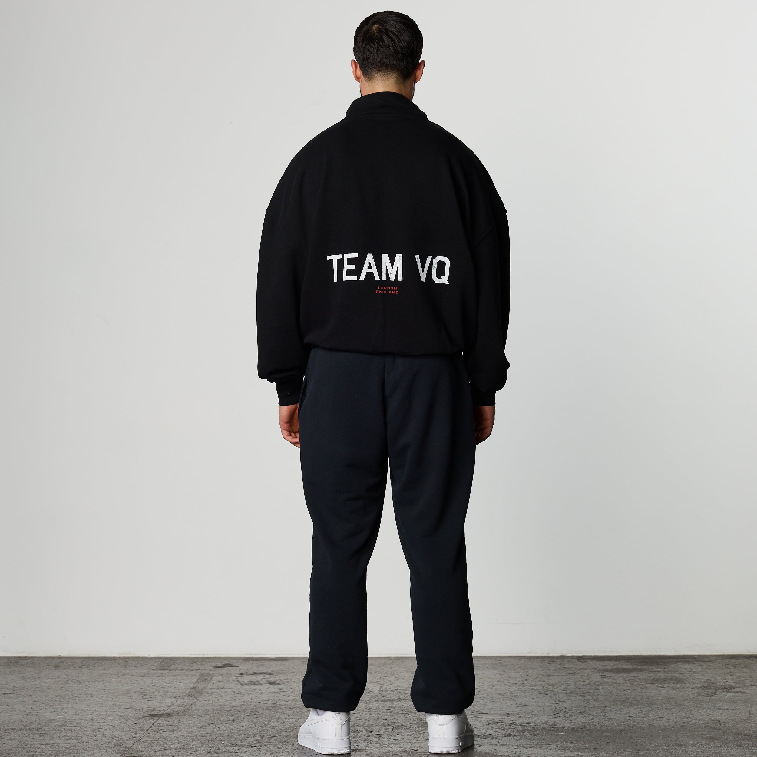 GOLDEN BOY BLACK OVERSIZED 1/4 ZIP SWEATER