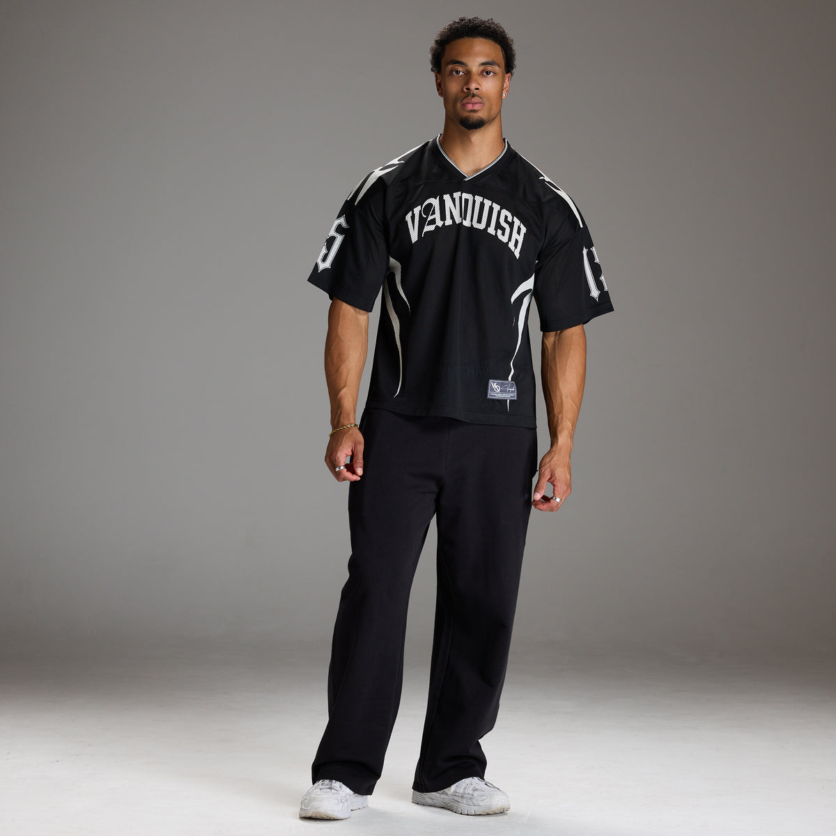 VARSITY TRIBAL BLACK OVERSIZED FOOTBALL T SHIRT