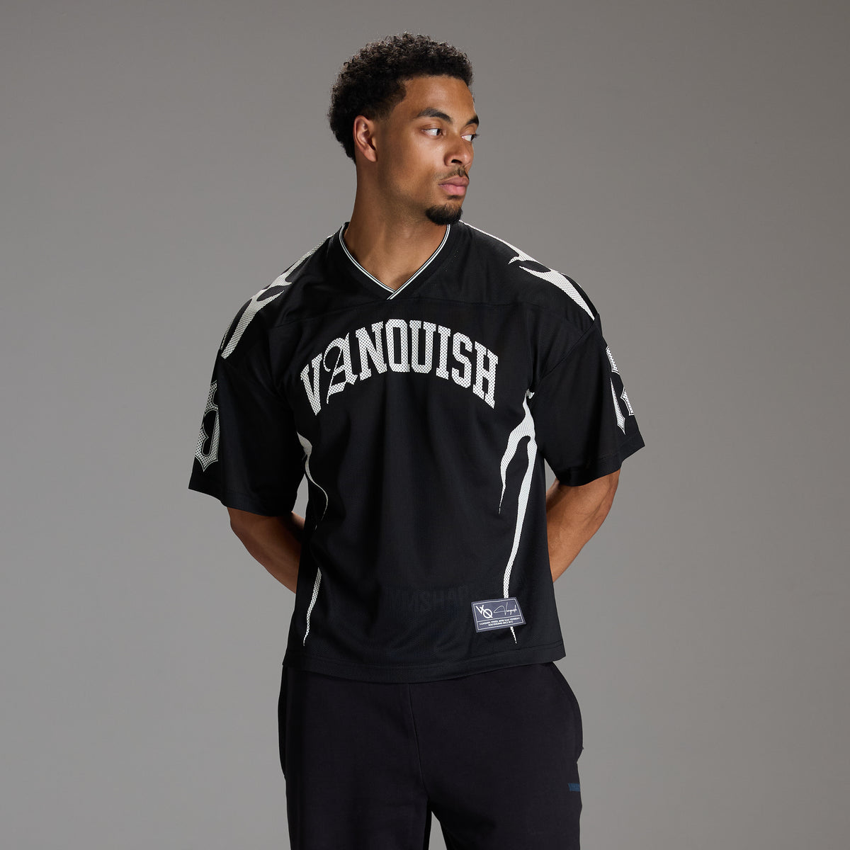 VARSITY TRIBAL BLACK OVERSIZED FOOTBALL T SHIRT