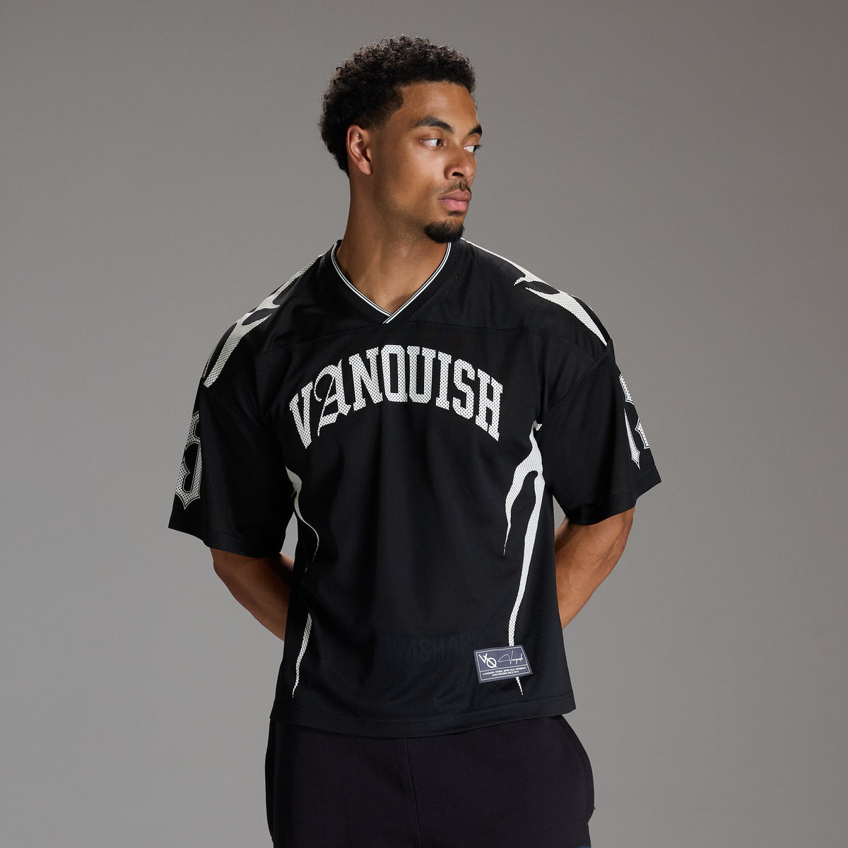 VARSITY TRIBAL BLACK OVERSIZED FOOTBALL T SHIRT