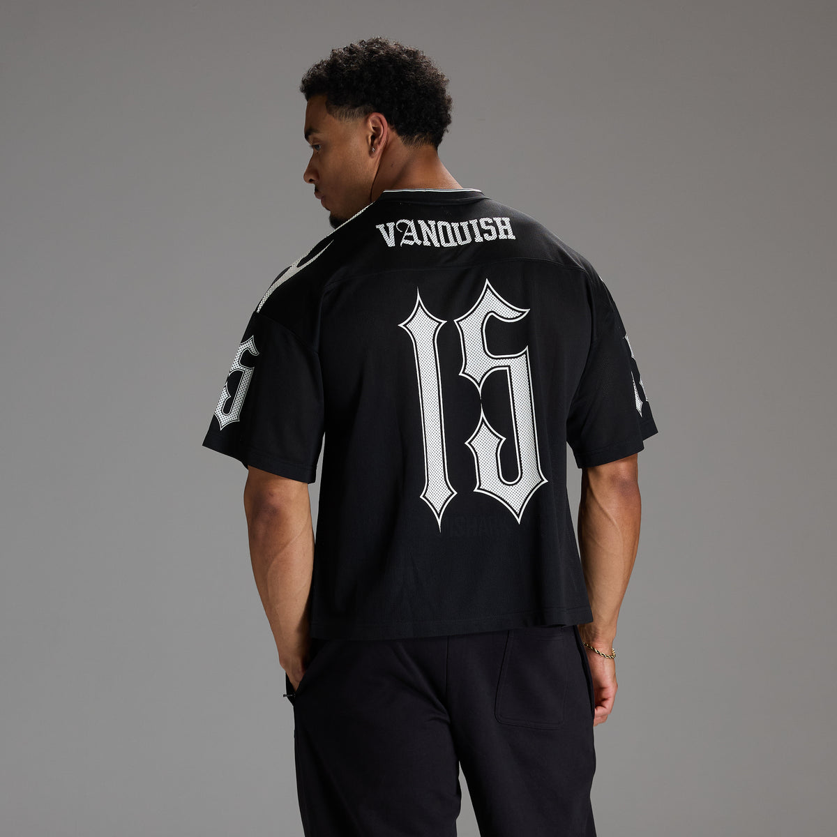 VARSITY TRIBAL BLACK OVERSIZED FOOTBALL T SHIRT
