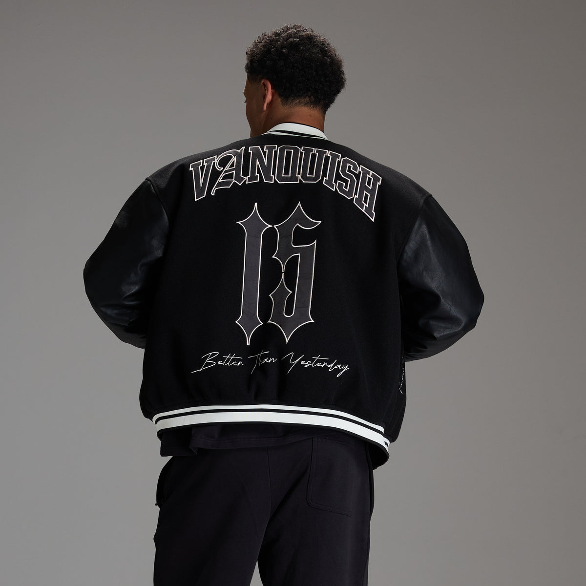 VARSITY BLACK OVERSIZED BOMBER JACKET