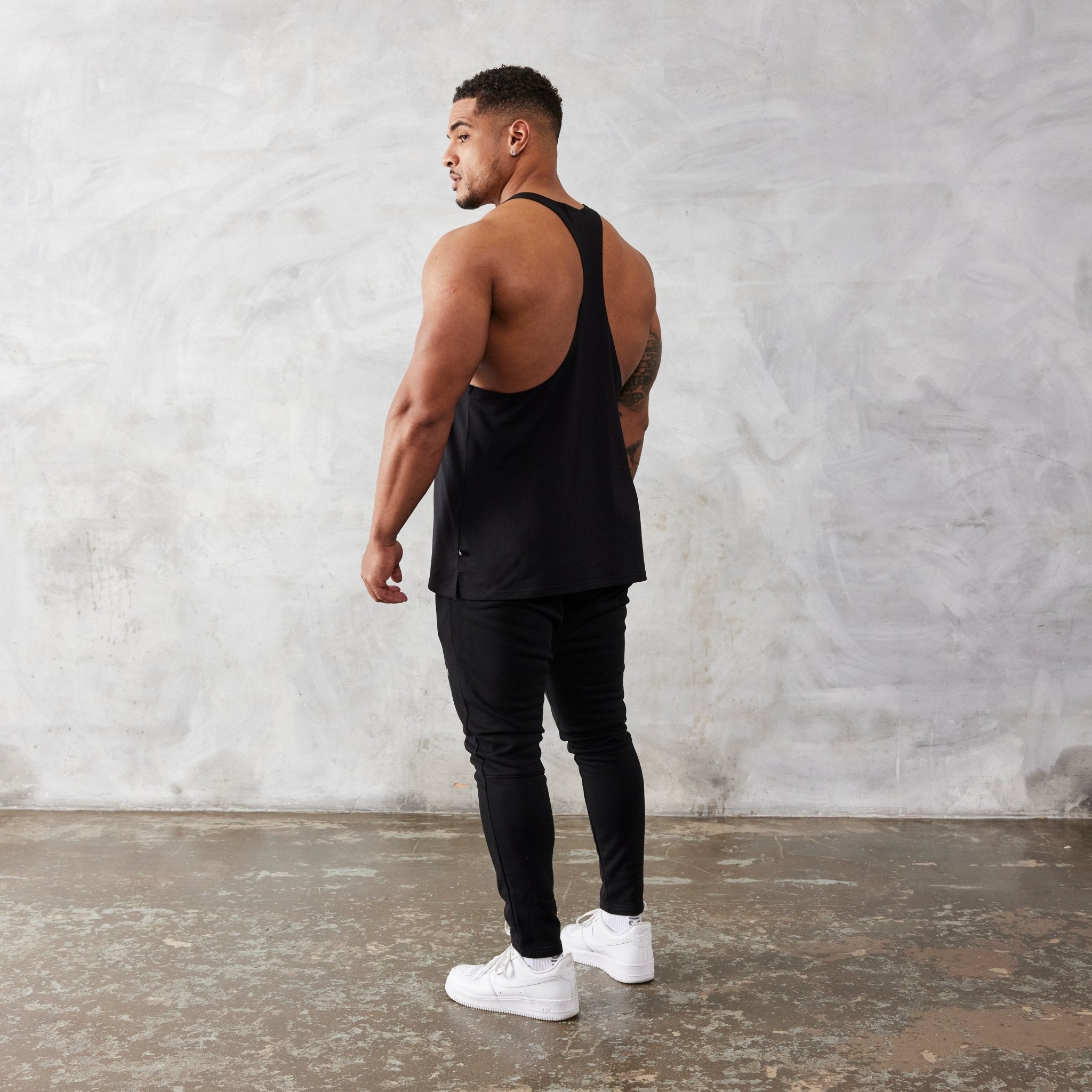Vanquish Essential Black Regular Fit Stringer Vest - Vanquish Fitness