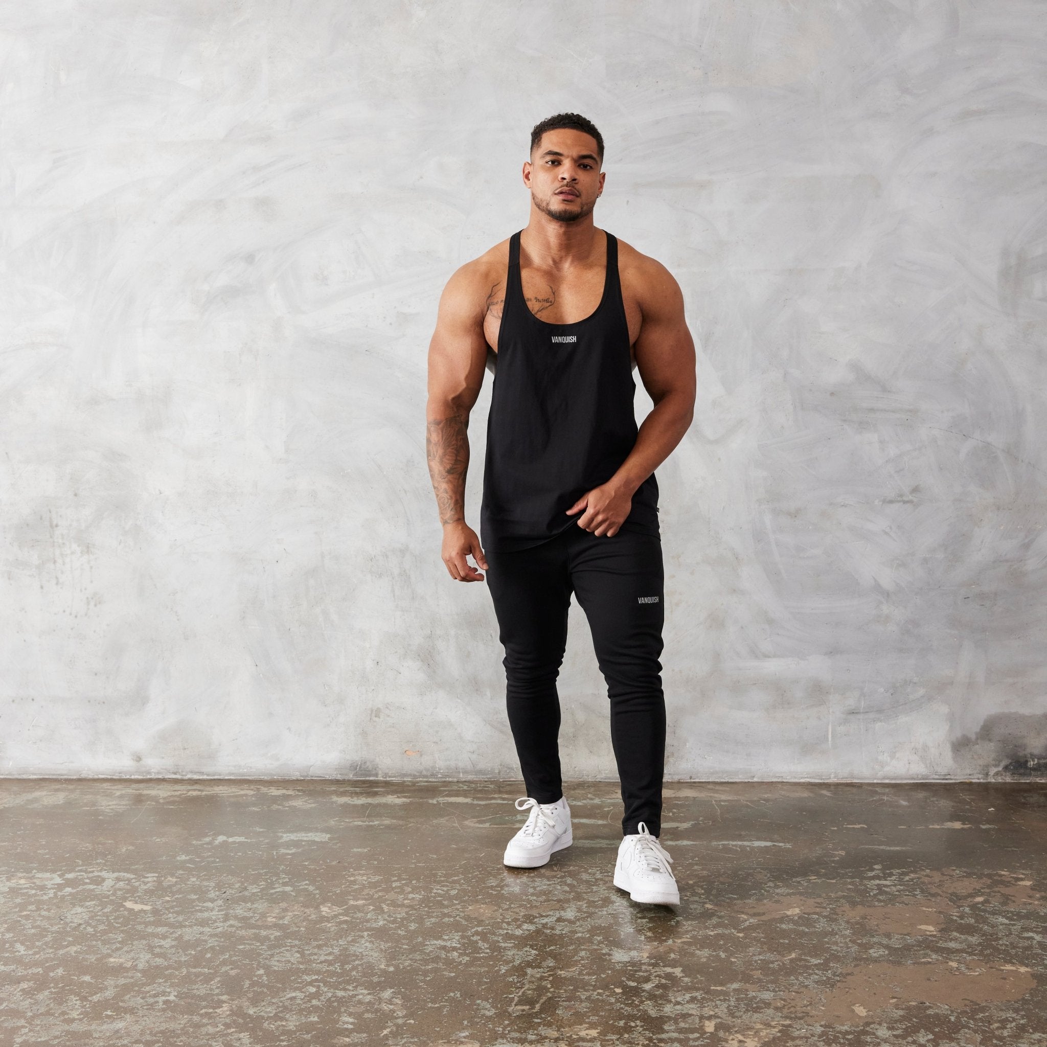 Vanquish Essential Black Regular Fit Stringer Vest - Vanquish Fitness