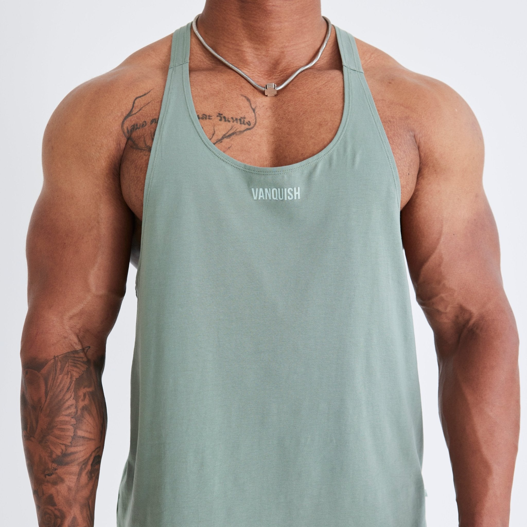 Vanquish Essential Green Regular Fit Stringer Vest - Vanquish Fitness