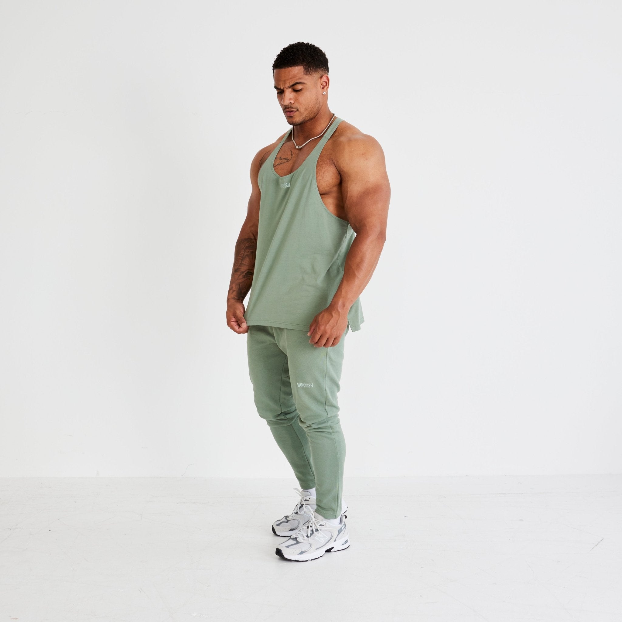 Vanquish Essential Green Regular Fit Stringer Vest - Vanquish Fitness