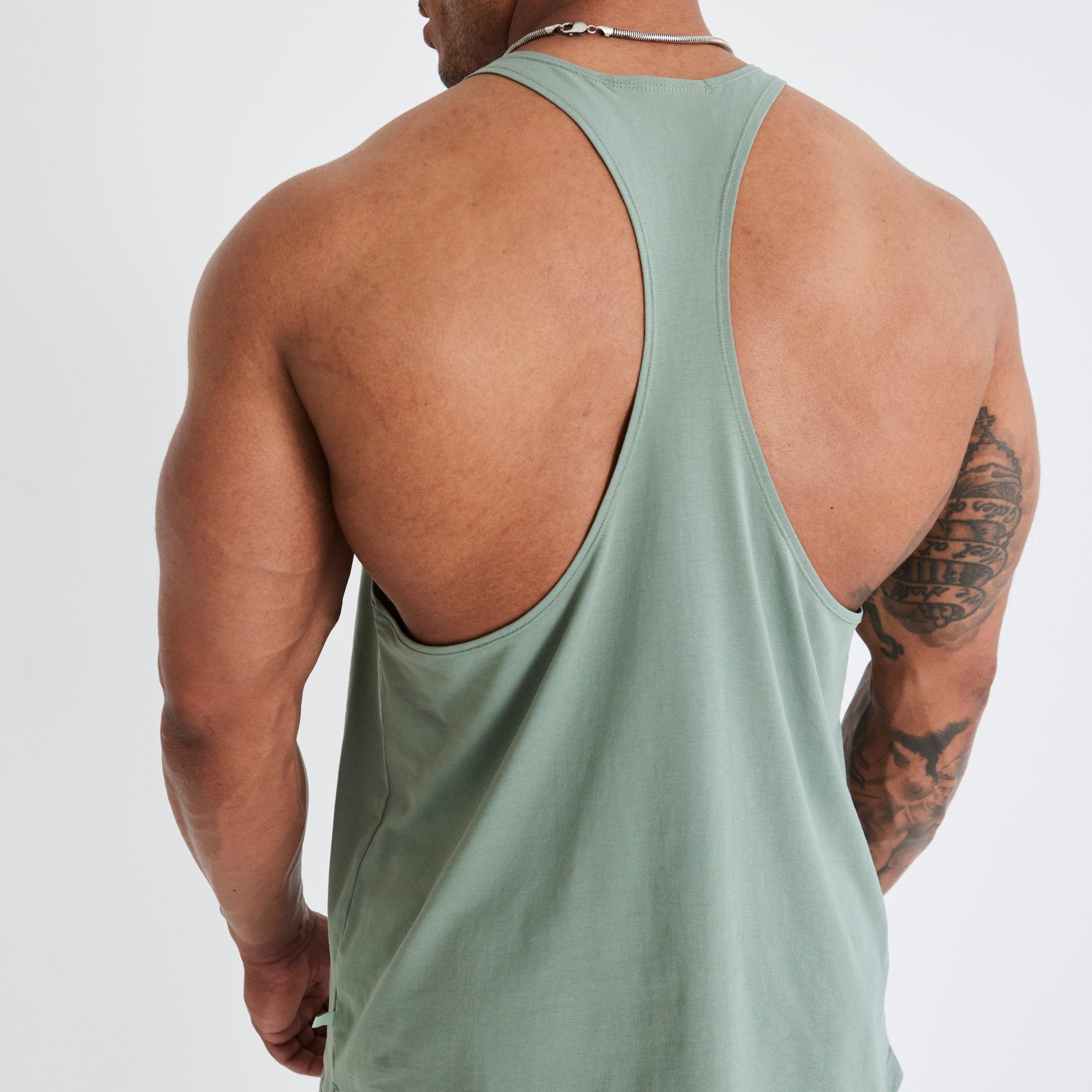 Vanquish Essential Green Regular Fit Stringer Vest - Vanquish Fitness