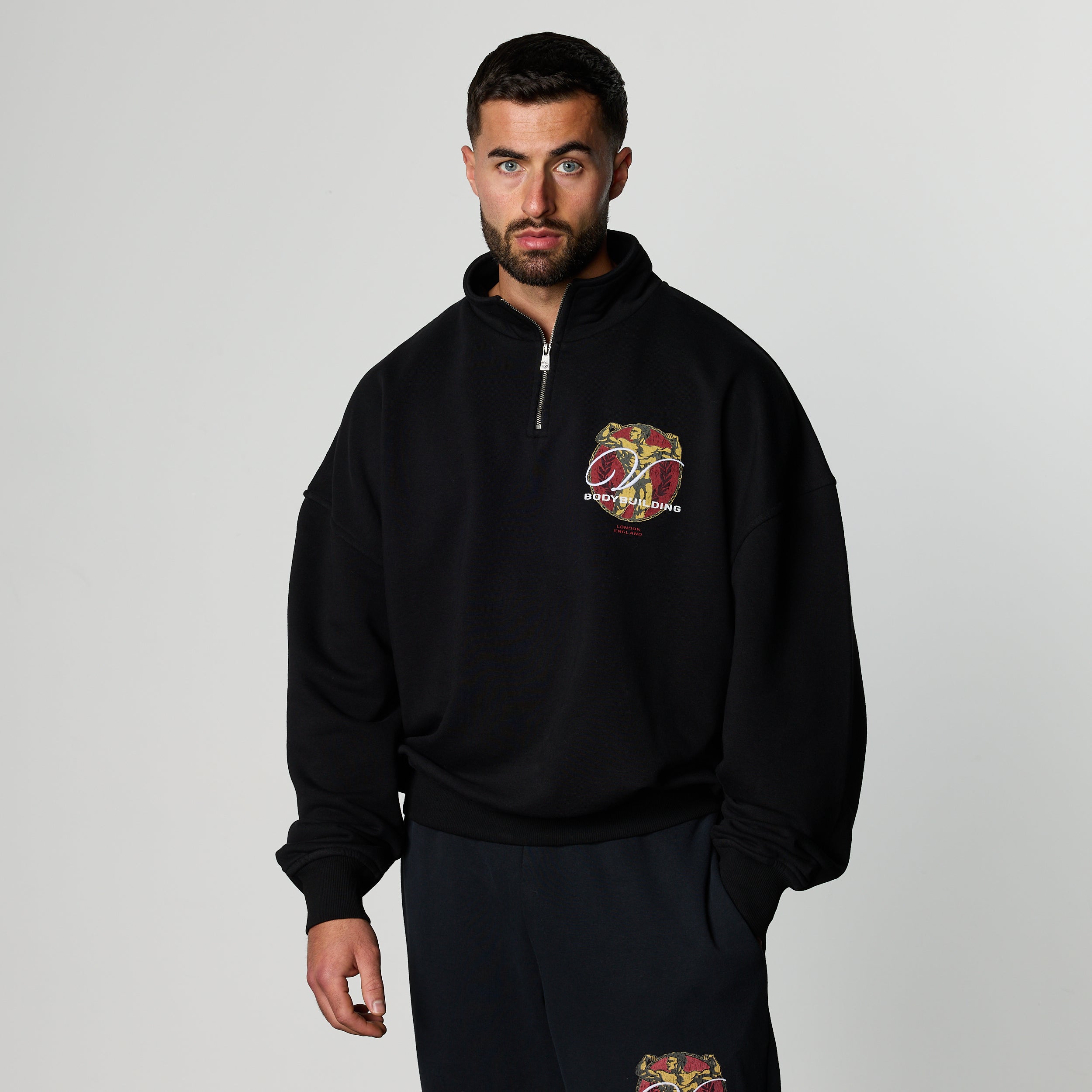 GOLDEN BOY BLACK OVERSIZED 1/4 ZIP SWEATER