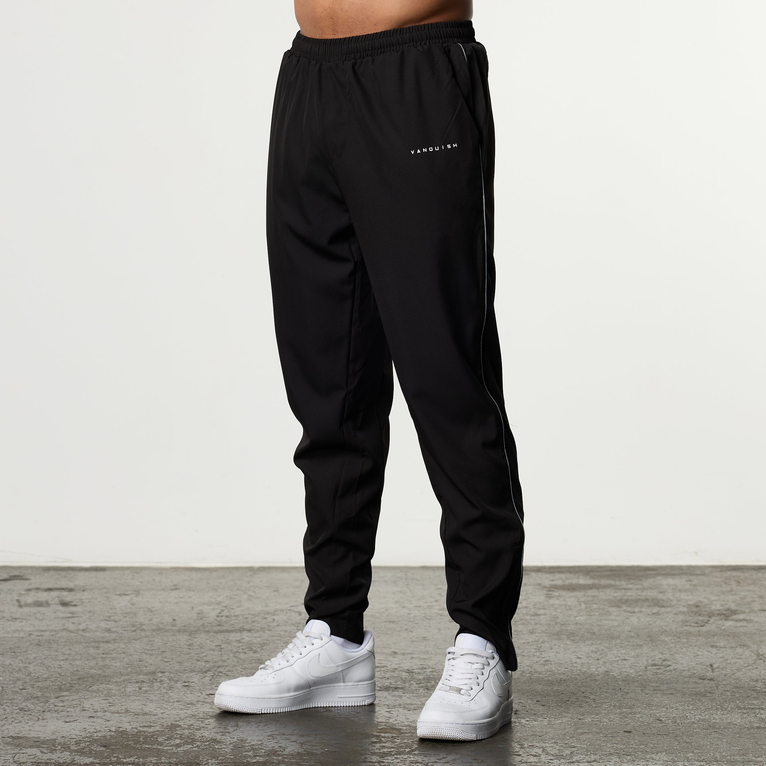 ACADEMY BLACK PERFORMANCE WOVEN SWEATPANTS