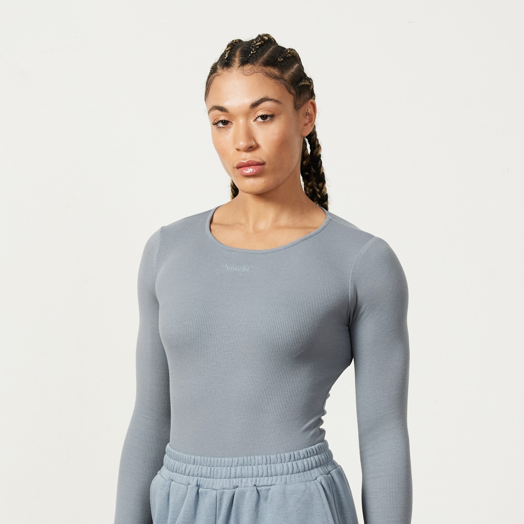 Dark gray bodysuit with anthracite ribbed cargo pants