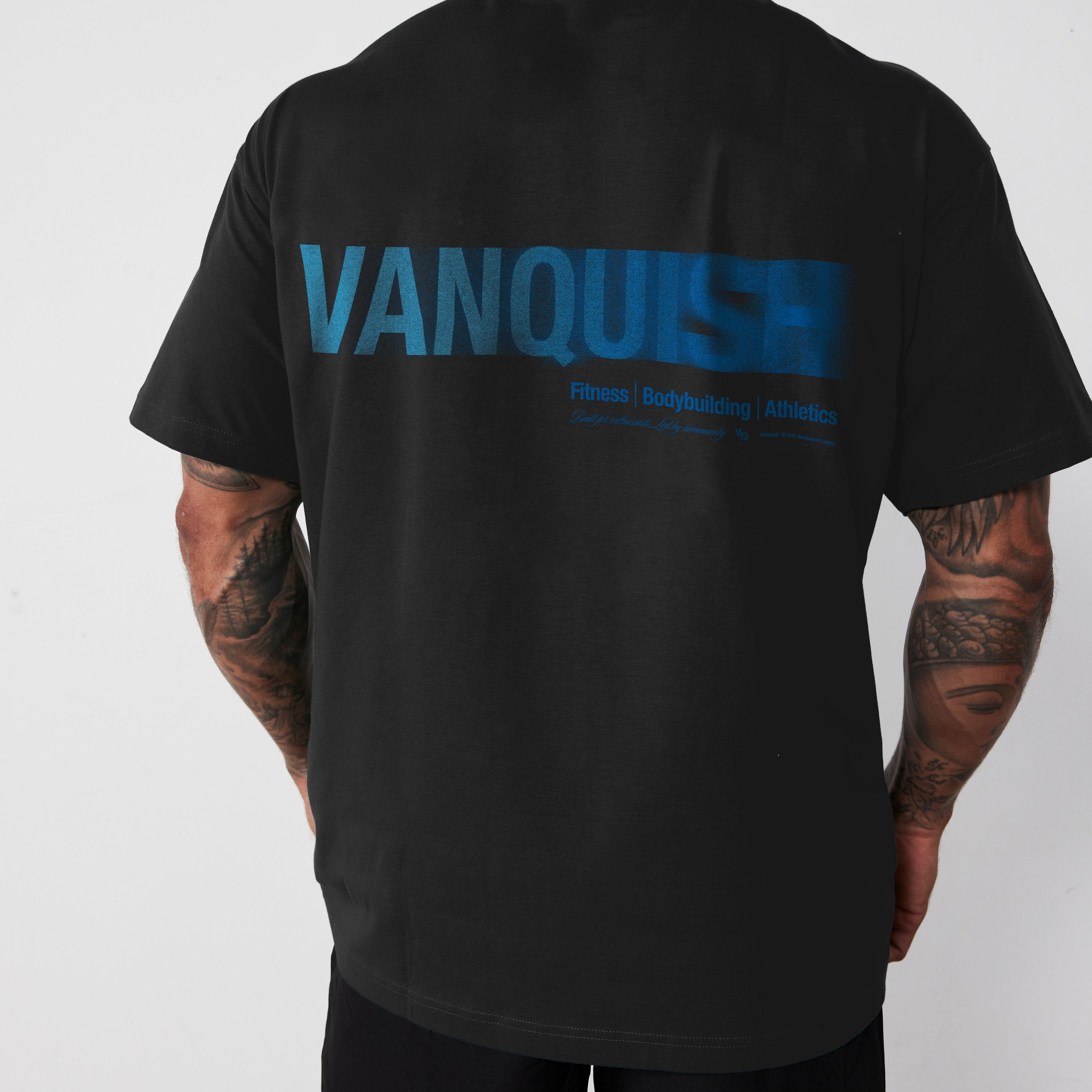 REVOLVE MOMENTUM BLACK AND BLUE BOXY T SHIRT