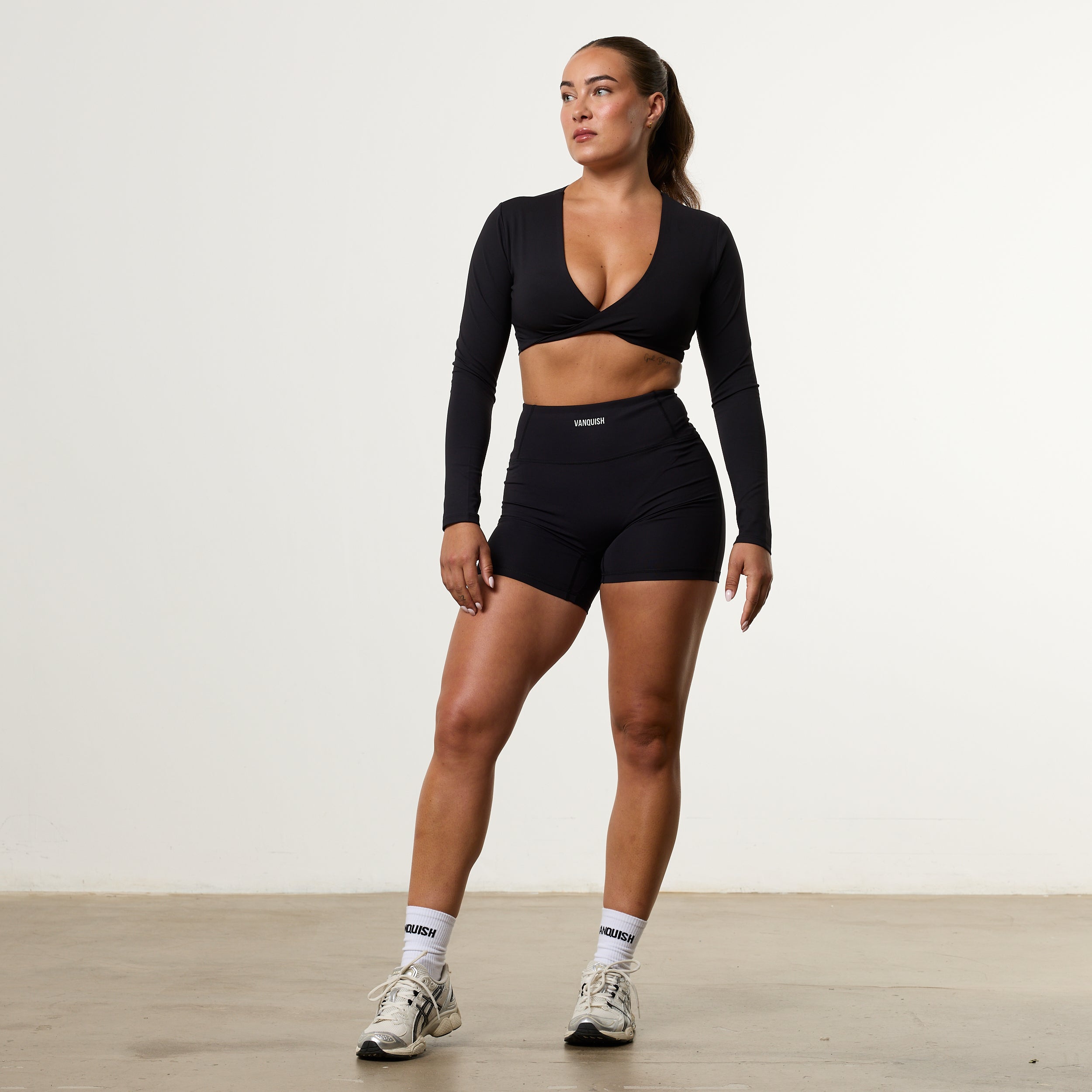 Enhance V2 Black Long Sleeve Twist Front Top