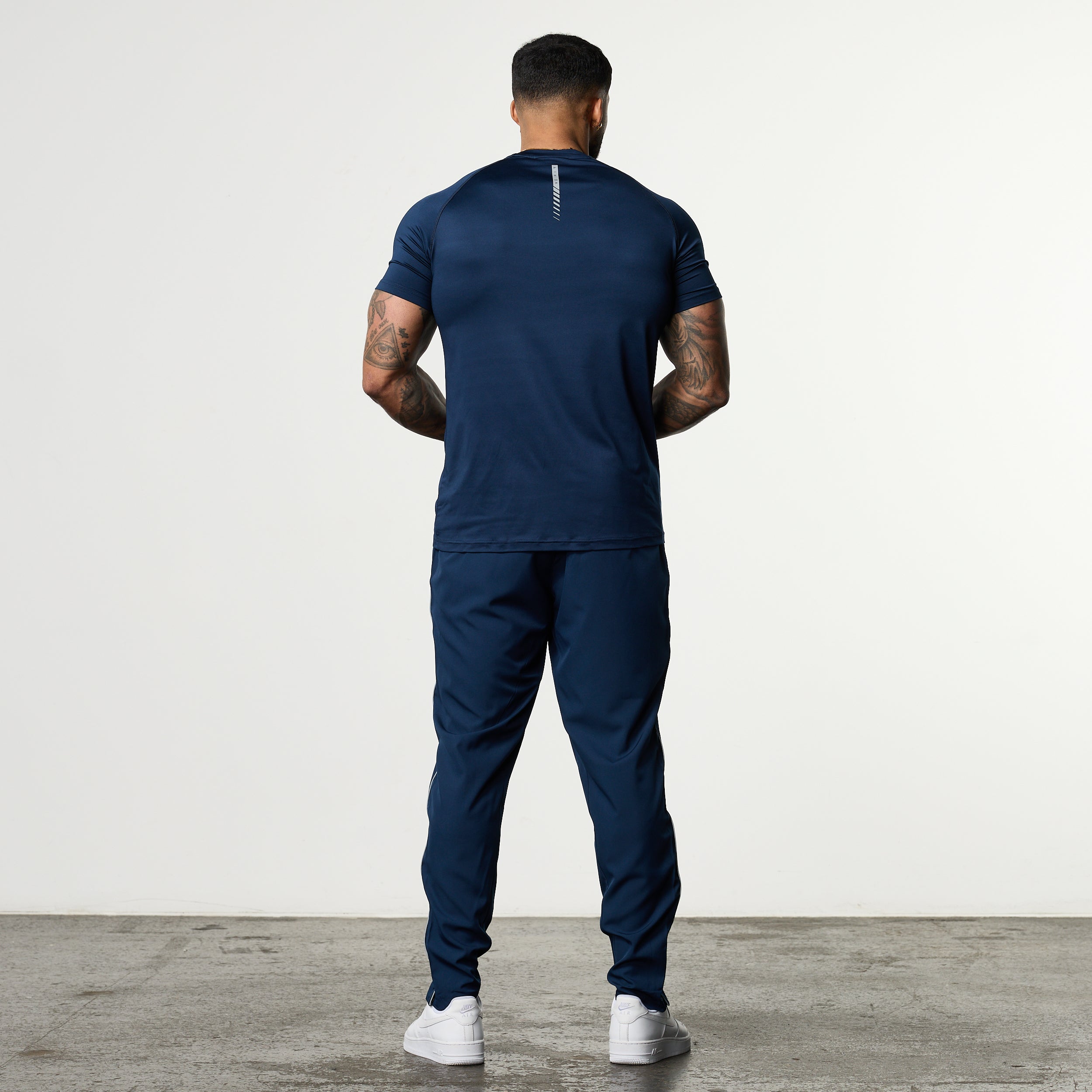 ACADEMY NAVY PERFORMANCE WOVEN SWEATPANTS