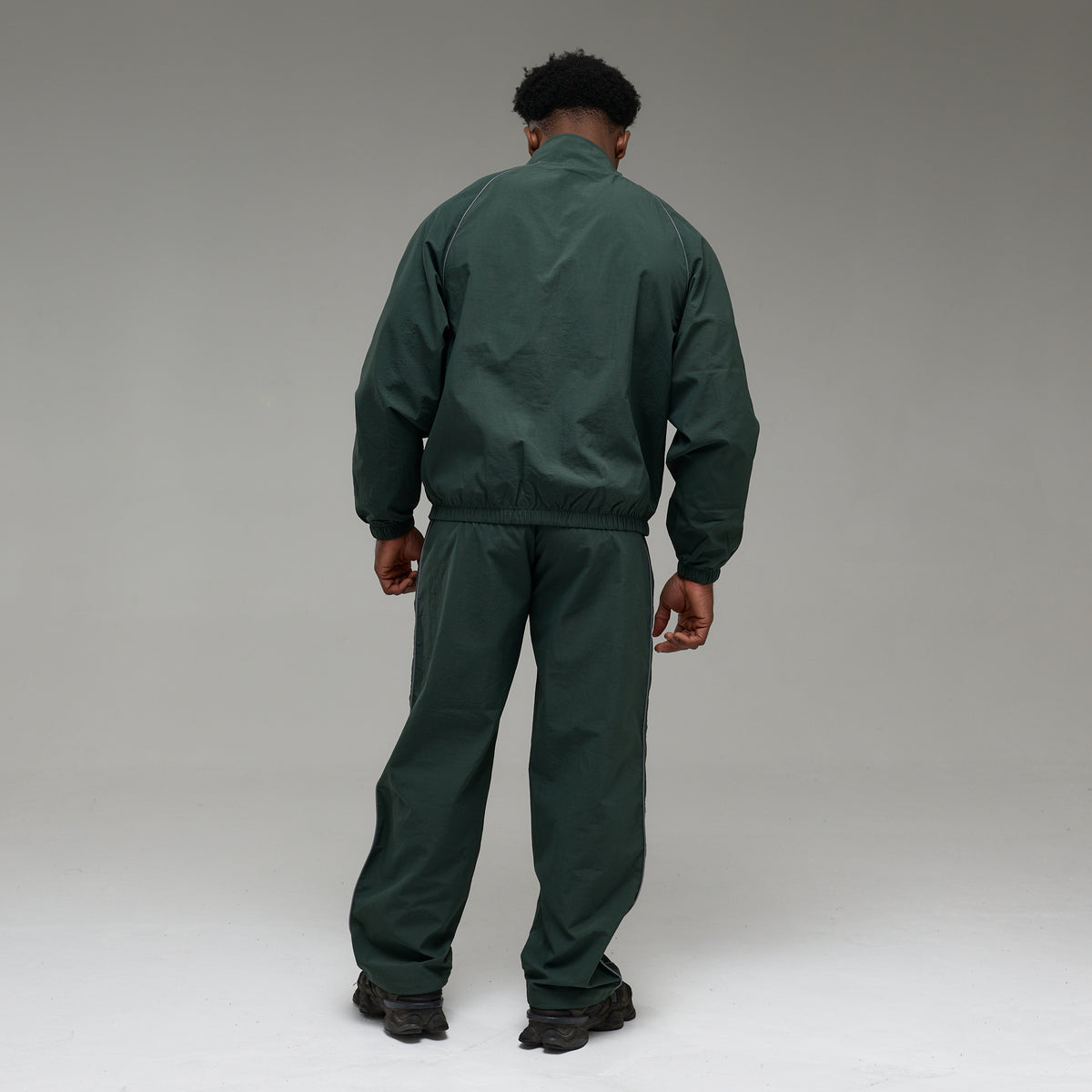 REFLECTIVE DARK GREEN OVERSIZED TRACK PANTS