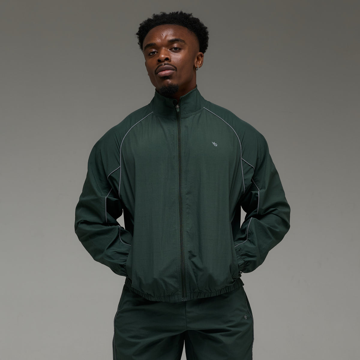 REFLECTIVE DARK GREEN OVERSIZED TRACK JACKET