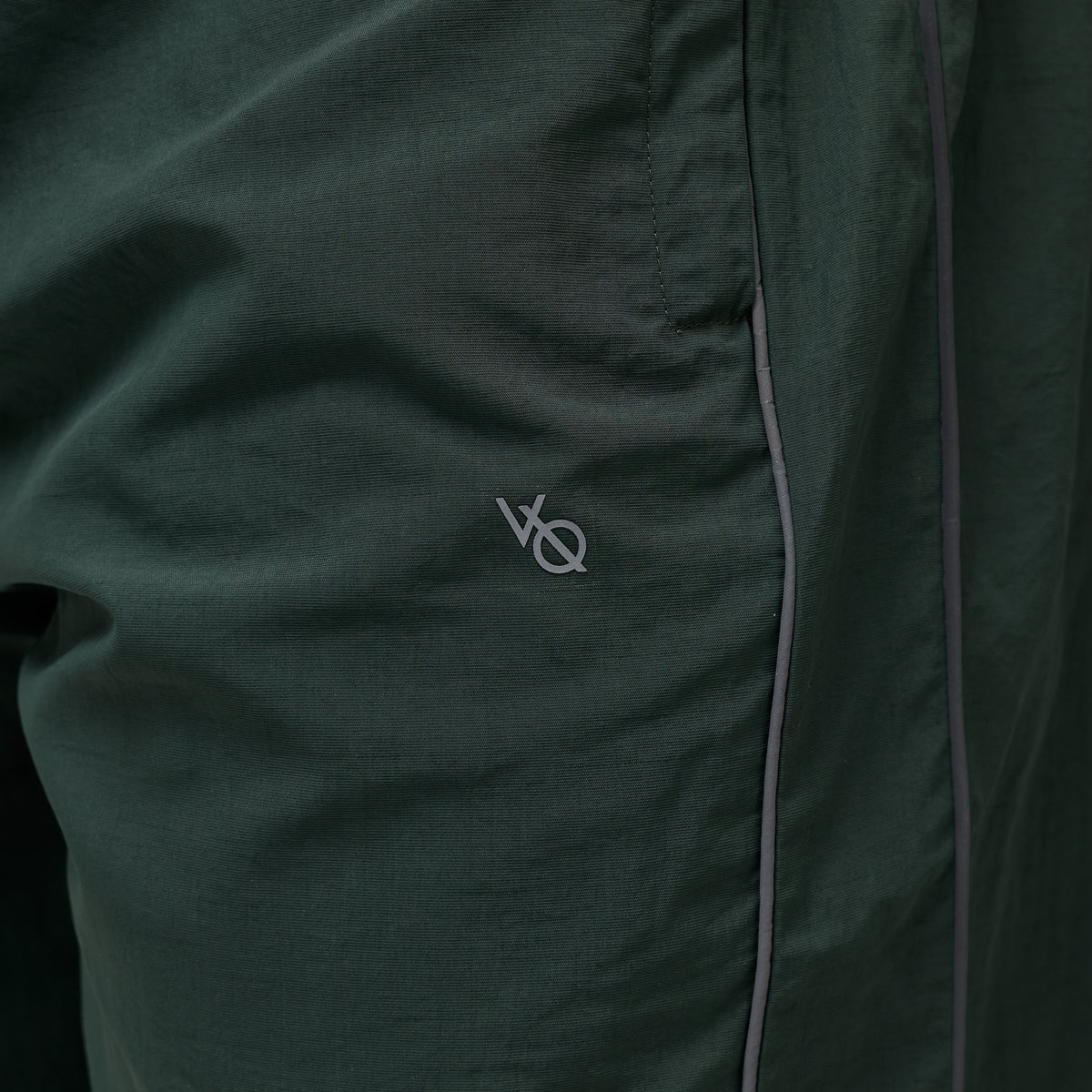 REFLECTIVE DARK GREEN OVERSIZED TRACK PANTS
