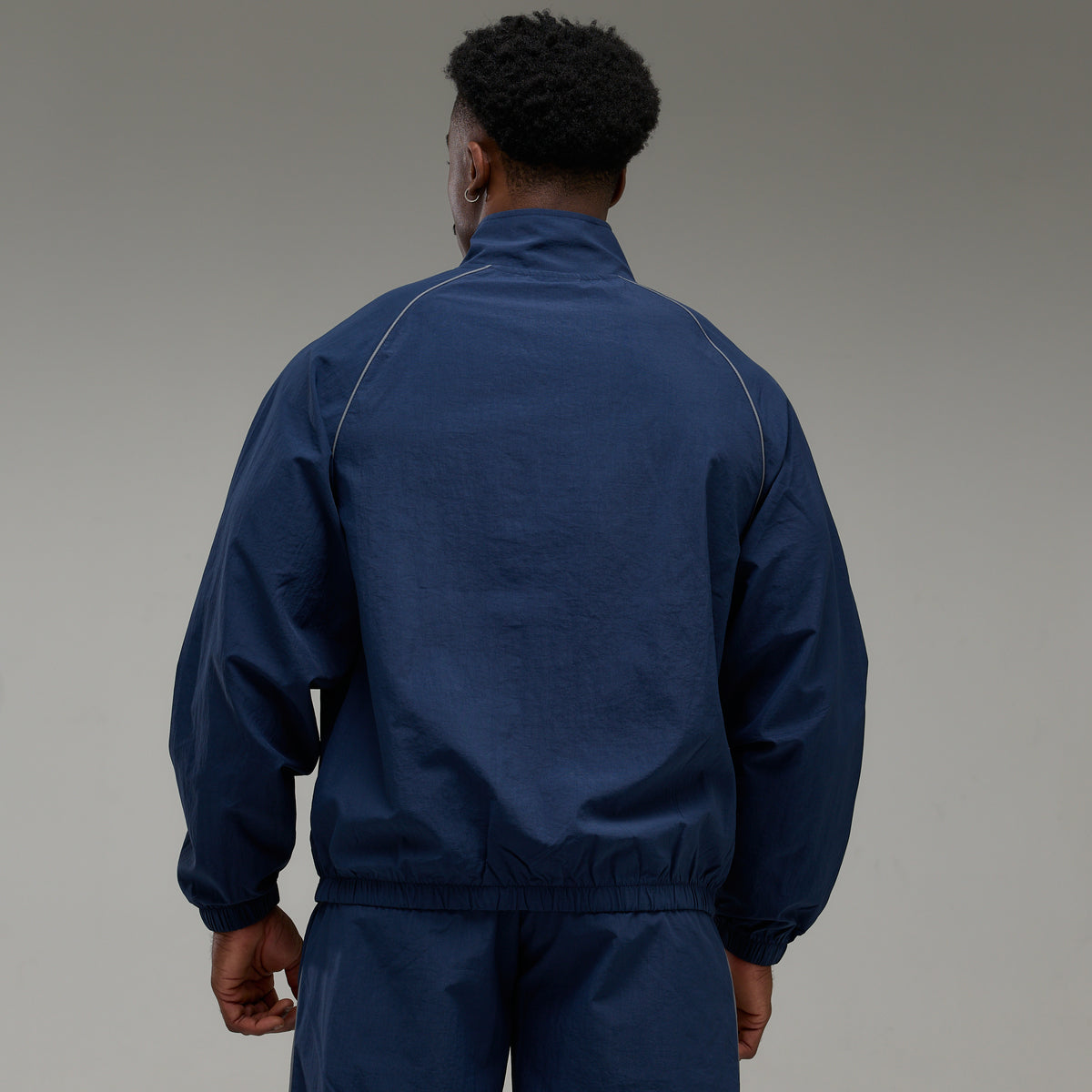 REFLECTIVE NAVY OVERSIZED TRACK JACKET