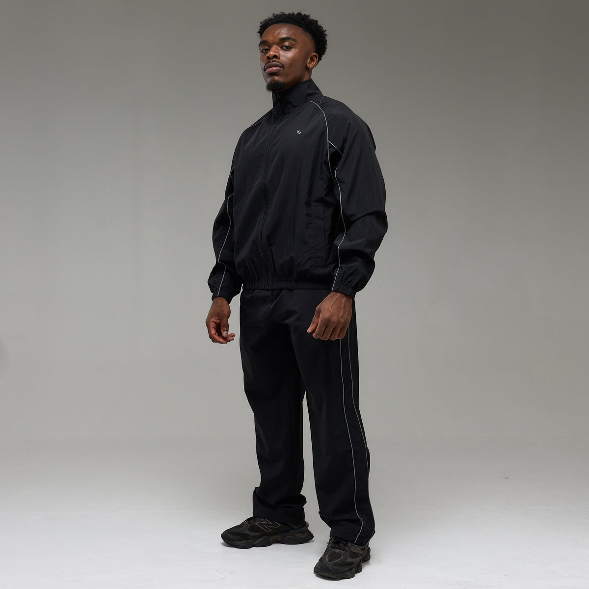 REFLECTIVE BLACK OVERSIZED TRACK PANTS