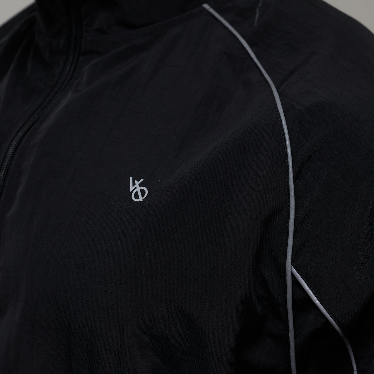 REFLECTIVE BLACK OVERSIZED TRACK JACKET