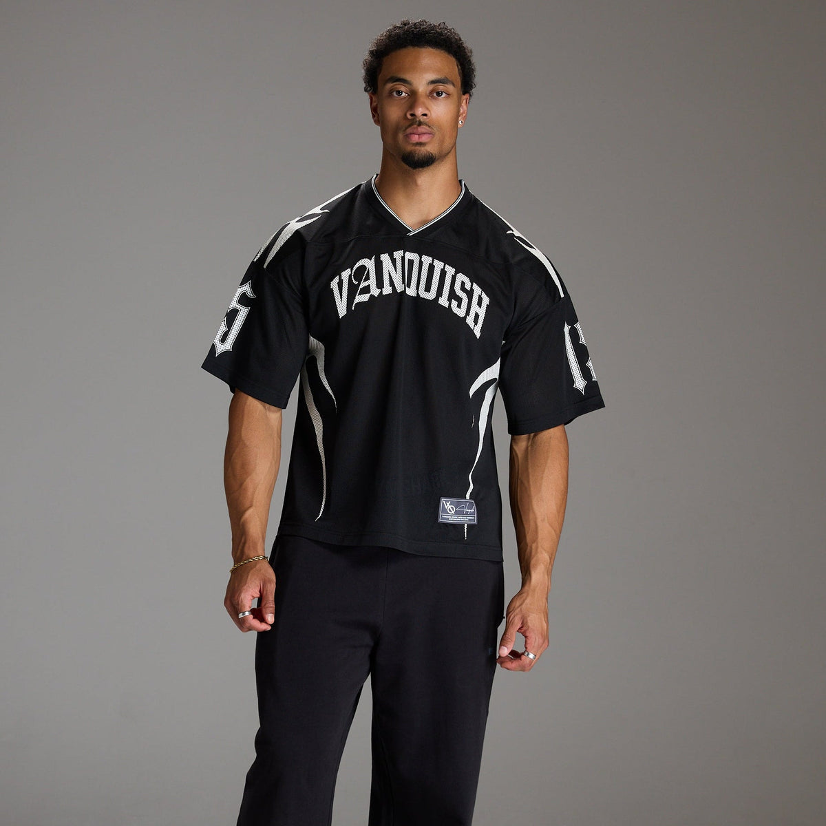 VARSITY TRIBAL BLACK OVERSIZED FOOTBALL T SHIRT