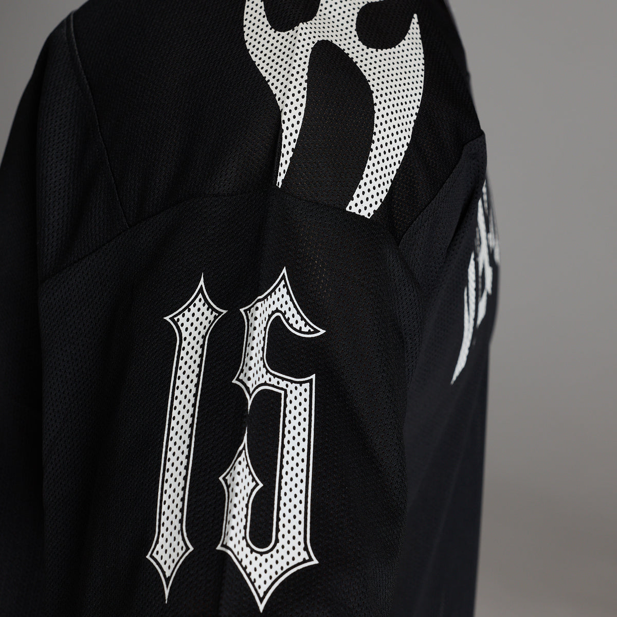 VARSITY TRIBAL BLACK OVERSIZED FOOTBALL T SHIRT
