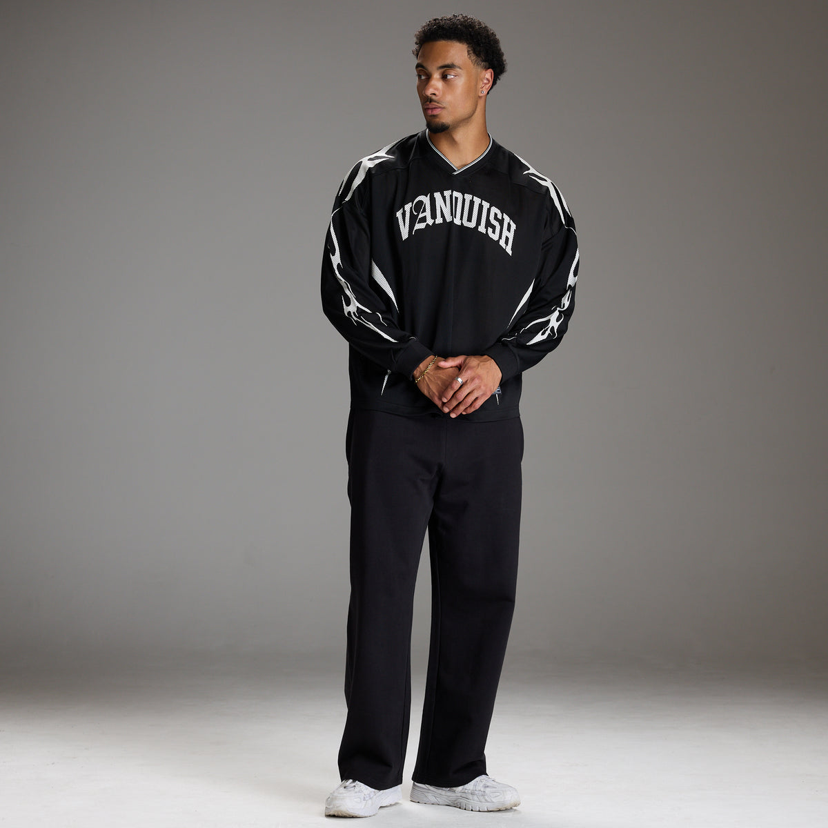 VARSITY TRIBAL BLACK OVERSIZED HOCKEY T SHIRT