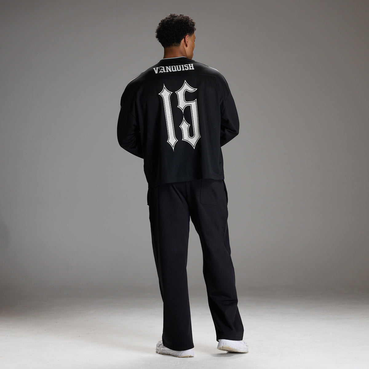 VARSITY TRIBAL BLACK OVERSIZED HOCKEY T SHIRT