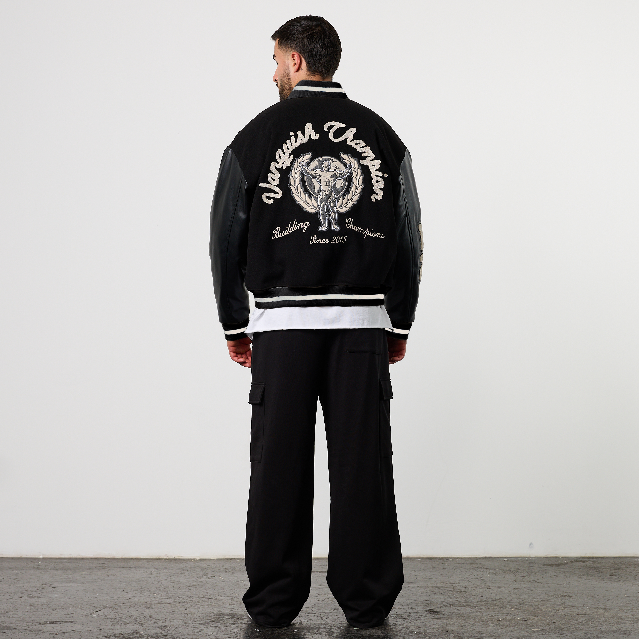 VANQUISH CHAMPION BLACK VARSITY JACKET