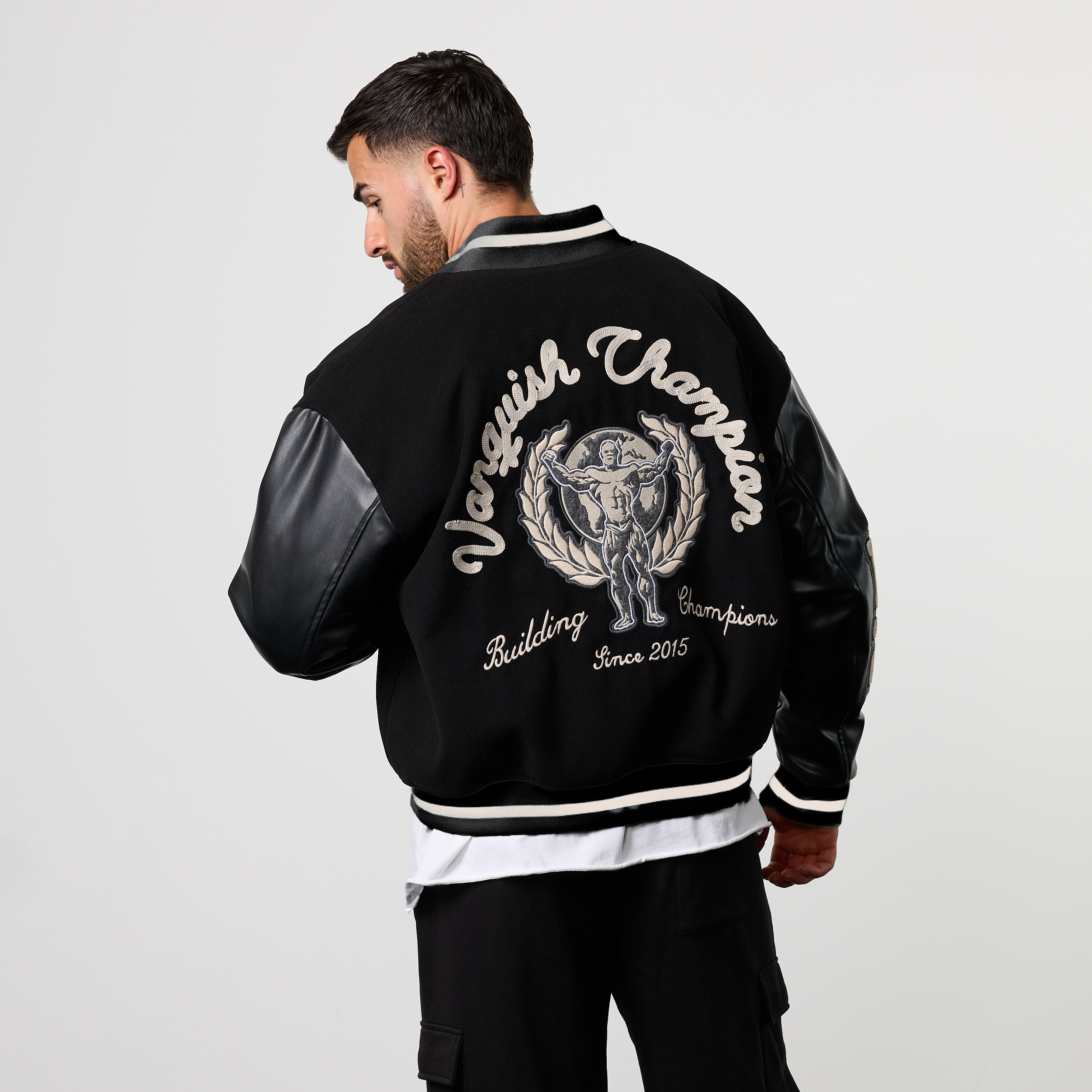VANQUISH CHAMPION BLACK VARSITY JACKET