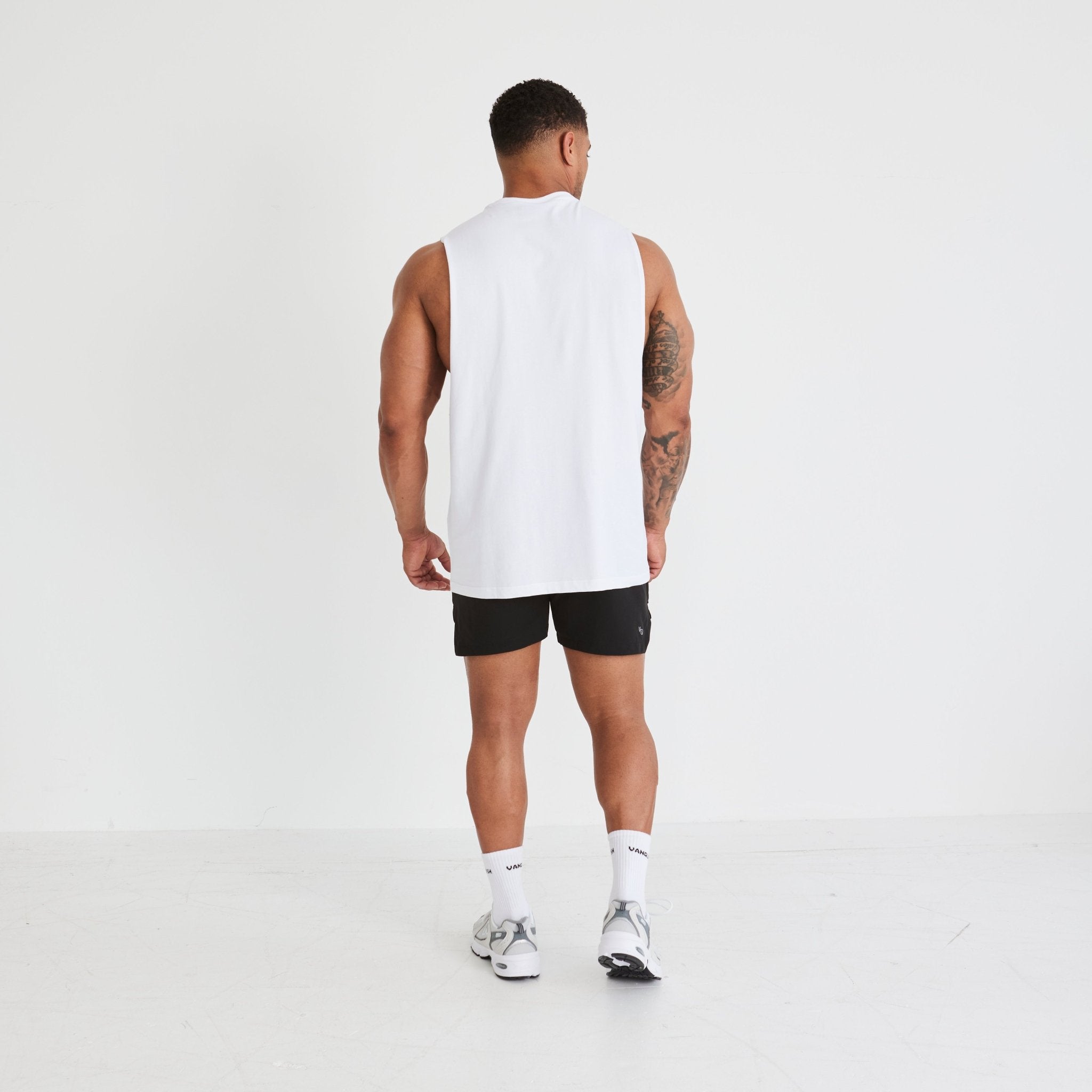 Vanquish Essential White Oversized Sleeveless T Shirt - Vanquish Fitness