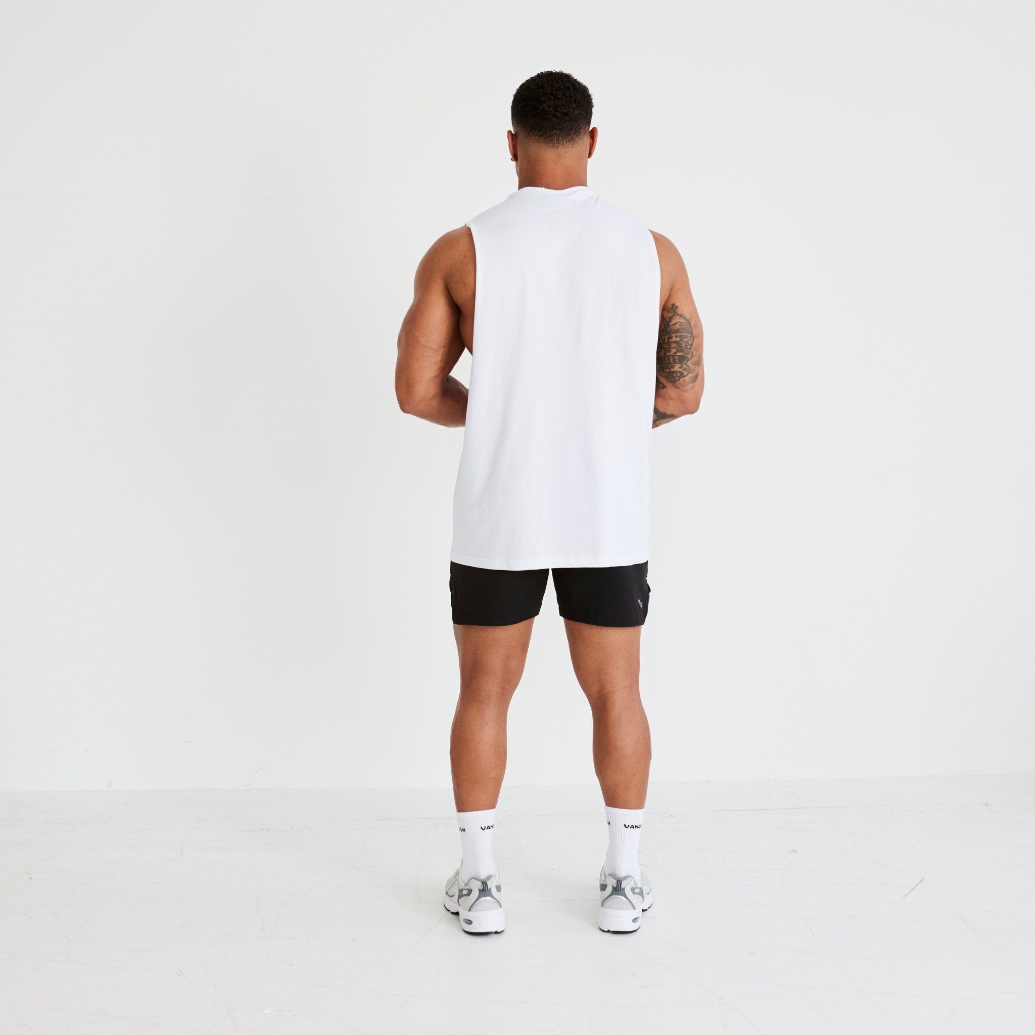 Vanquish Essential White Oversized Sleeveless T Shirt - Vanquish Fitness