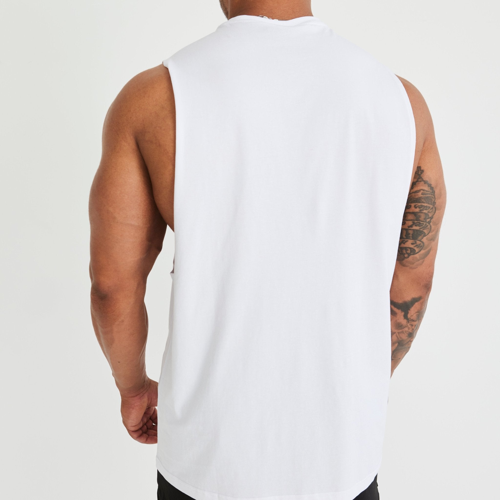 Vanquish Essential White Oversized Sleeveless T Shirt - Vanquish Fitness