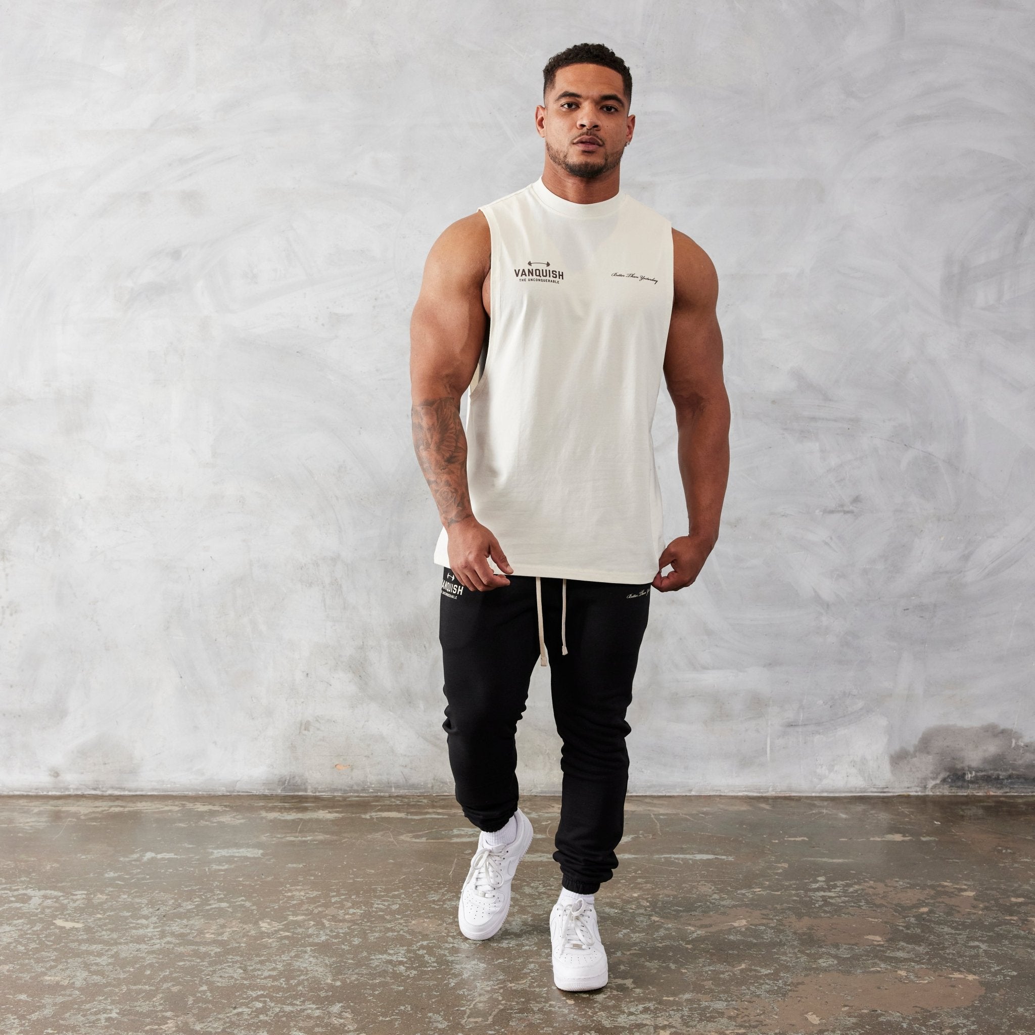 Vanquish Vintage White Unconquerable Oversized Sleeveless T Shirt - Vanquish Fitness