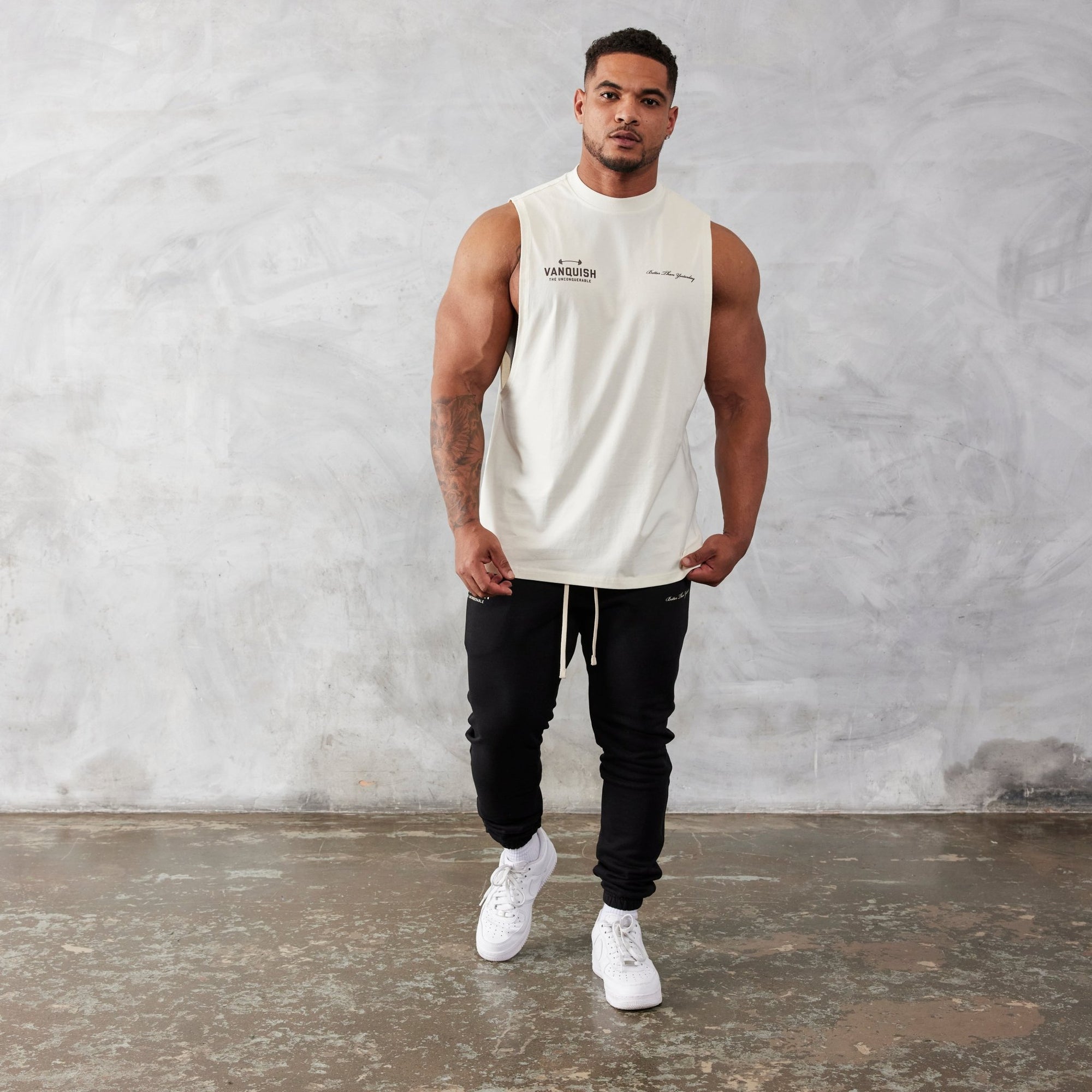 Vanquish Vintage White Unconquerable Oversized Sleeveless T Shirt - Vanquish Fitness